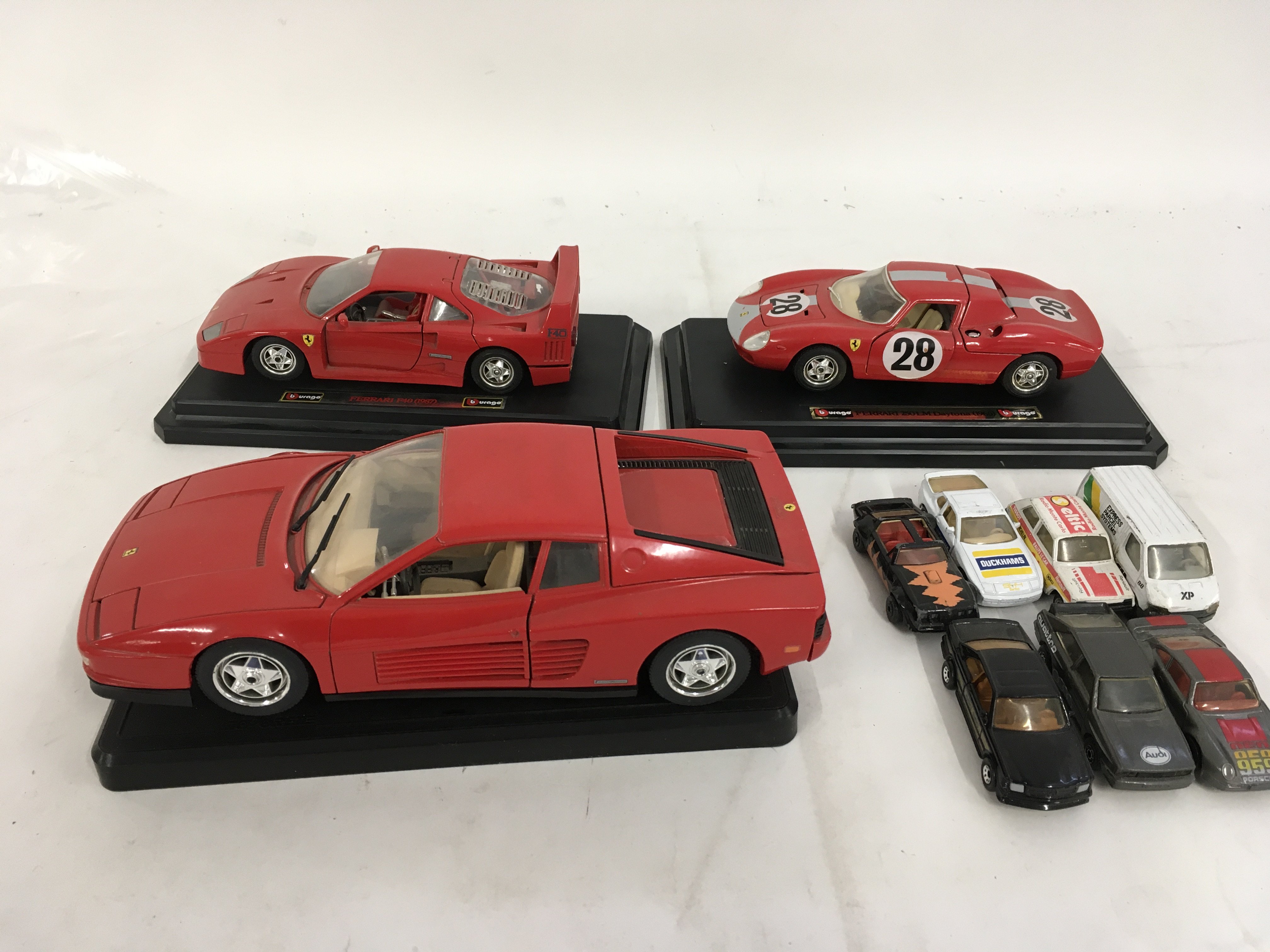 3 x model Ferraris by Burago and 7x Playworn diecast cars. No reserve