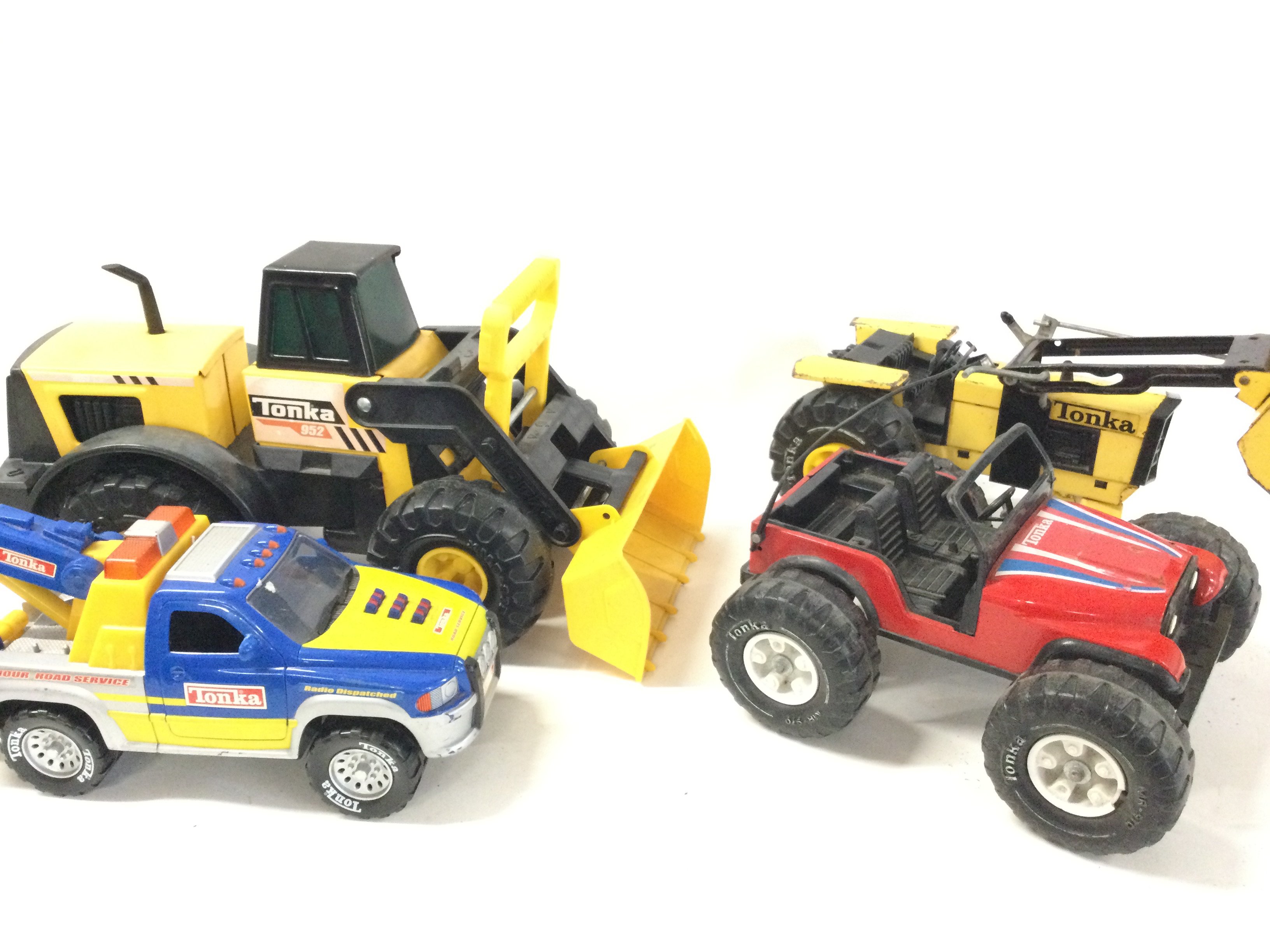 A Box Containing a Collection of Tonka Toys.