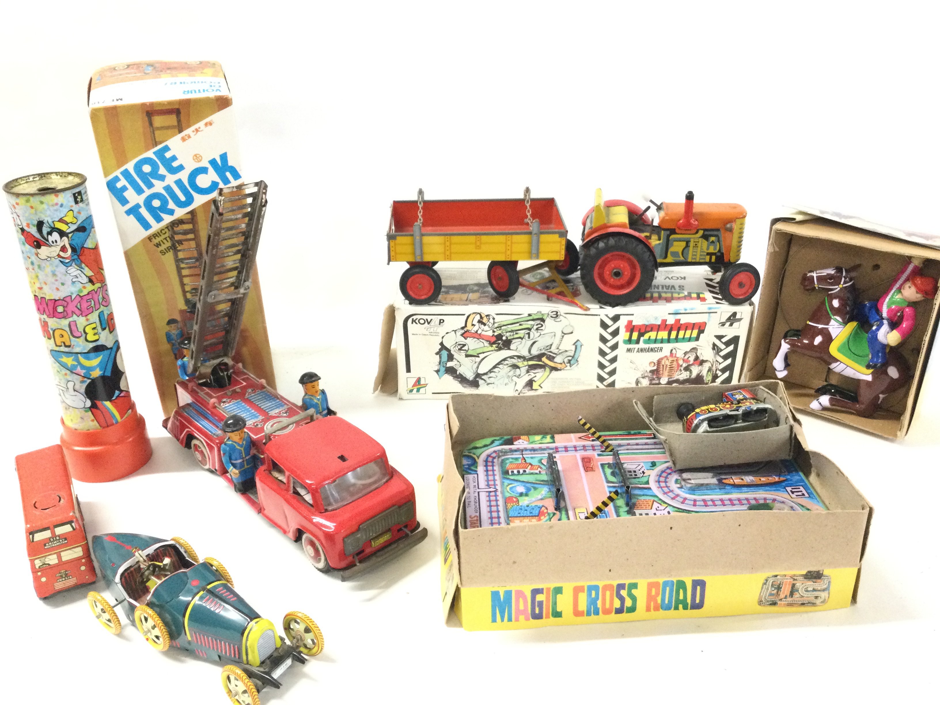 A Collection of Various Boxed And Loose Tinplate Toys. And A Vintage Cowboy Toy Watch.