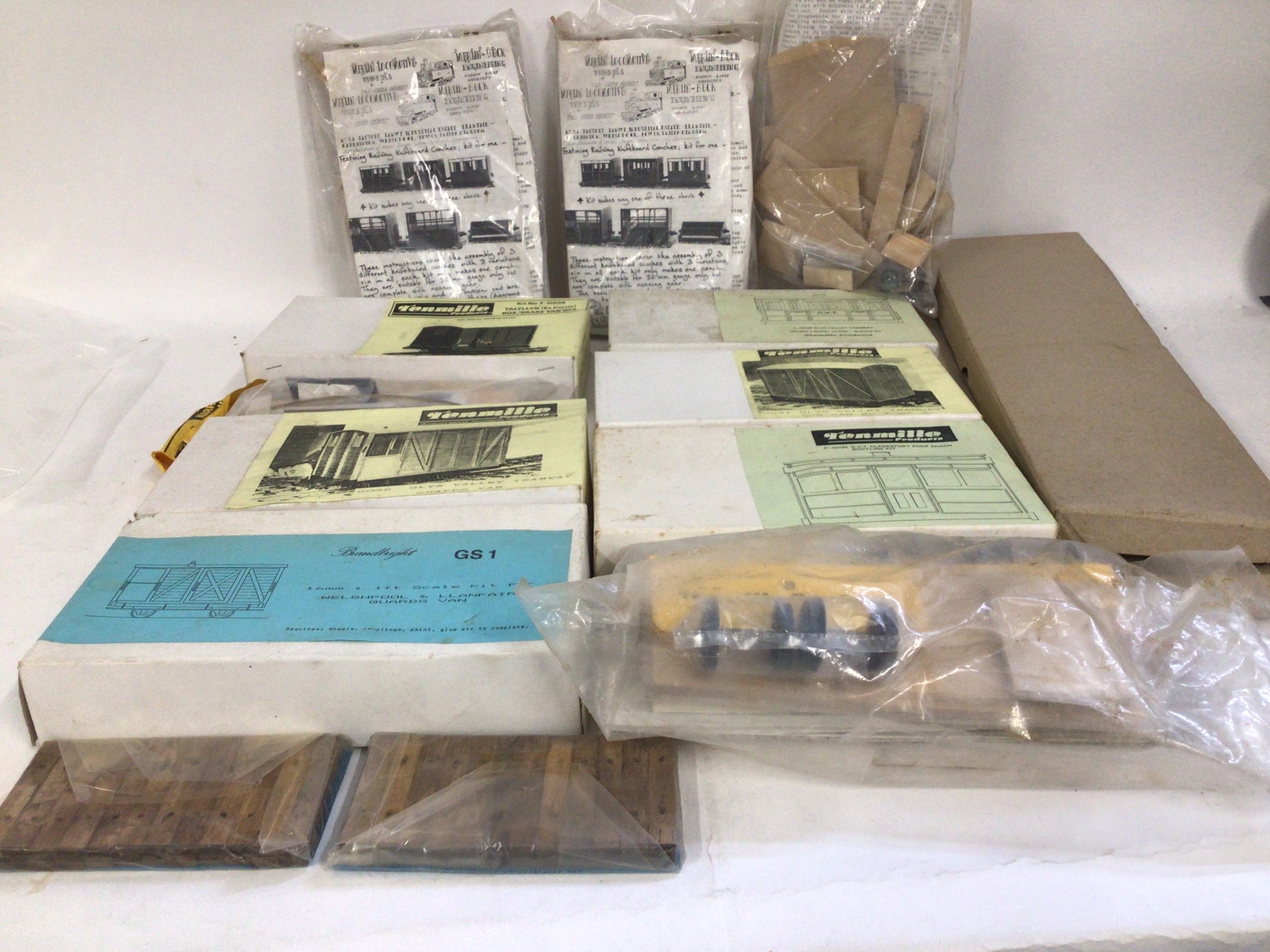 A collection of of approximately 10 model kits to create wooden railway wagons. Manufacturers include Tenmille Products ..Brandbright etc. no reserve