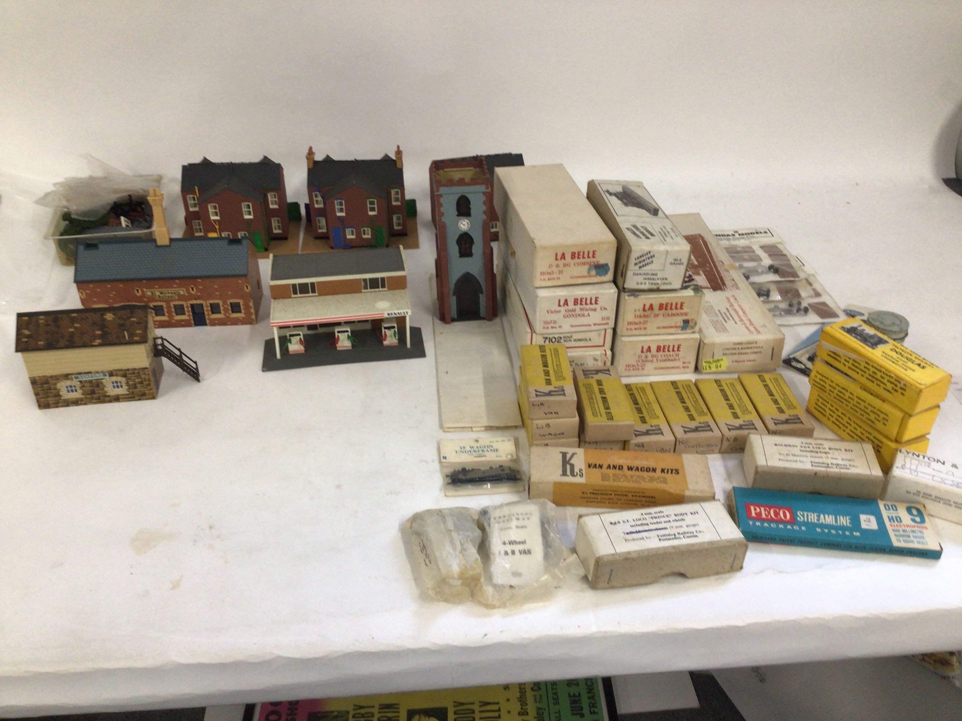 A mixed collection of model railway pieces, including buildings, kits to build wagons ..coaches and locomotives mostly N gauge. No reserve