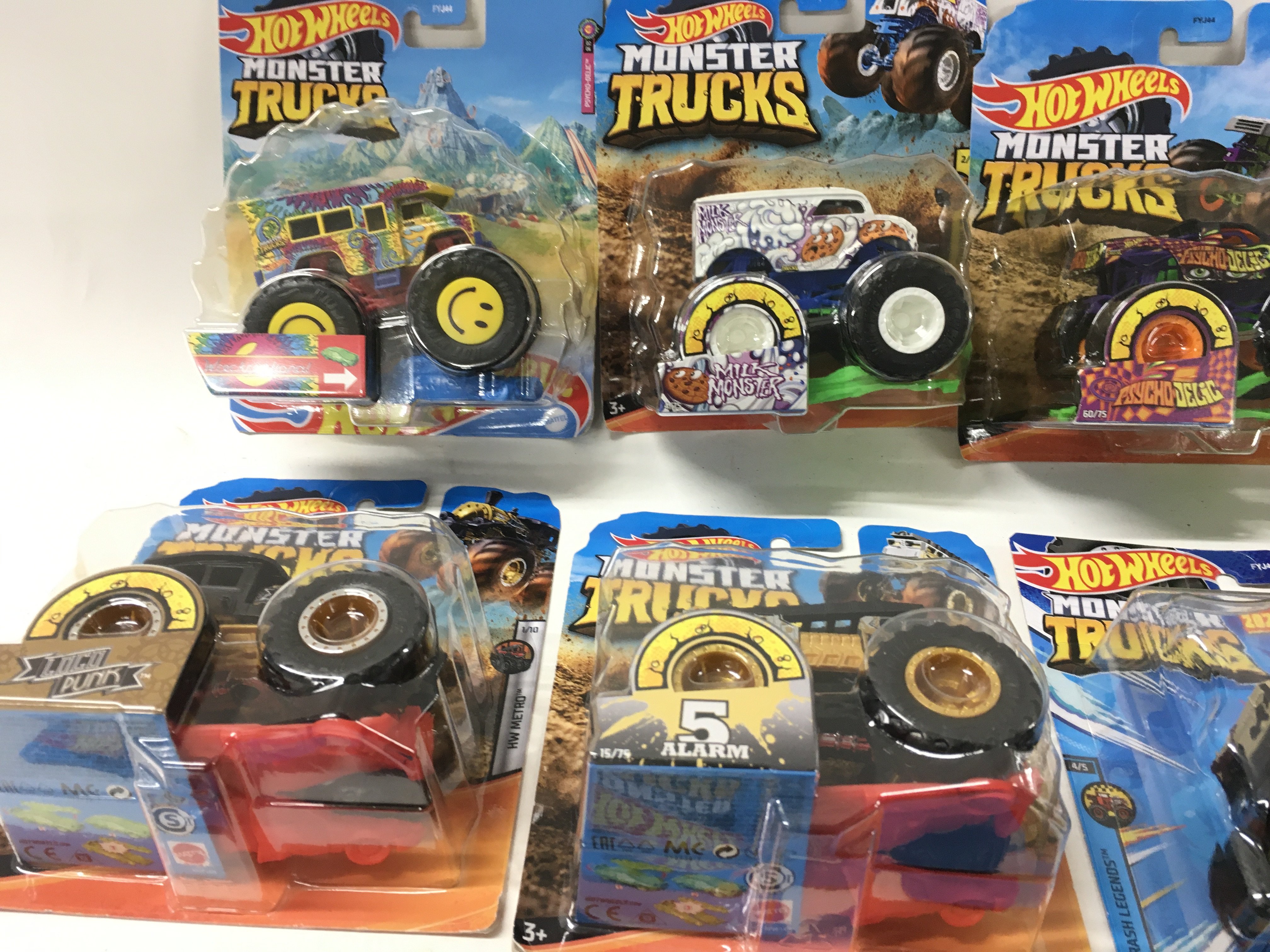 A collection of 12 unopened Hot Wheels Monster Trucks 1:64 scale. Includes Bone Shaker ..Milk Monster plus others. No reserve