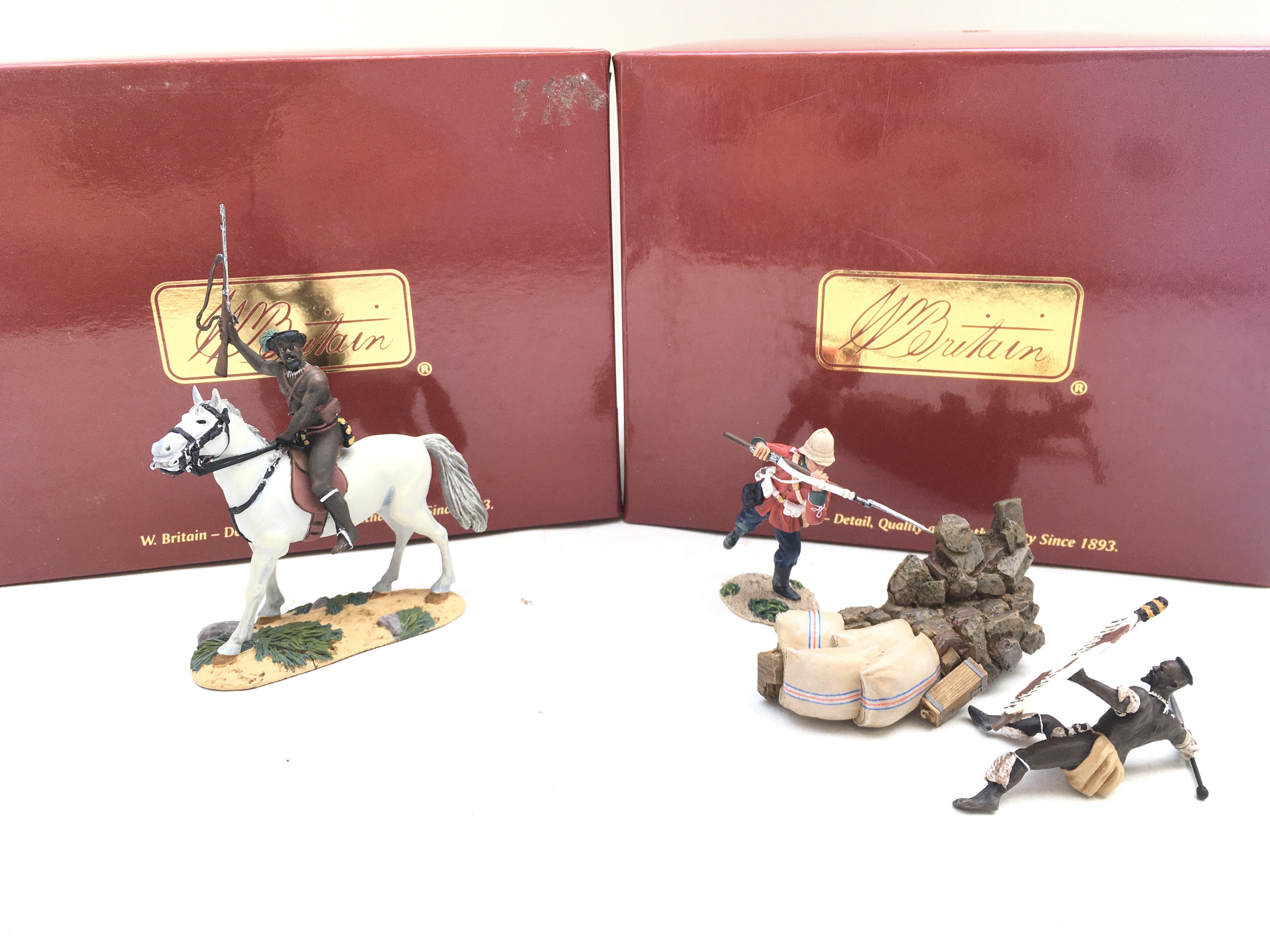 2 X Boxed Britains Zulu Sets. A Zulu Imduna- Prince Dabulamanzi. Mounted and Down But Not Out. With Certificates. (2)