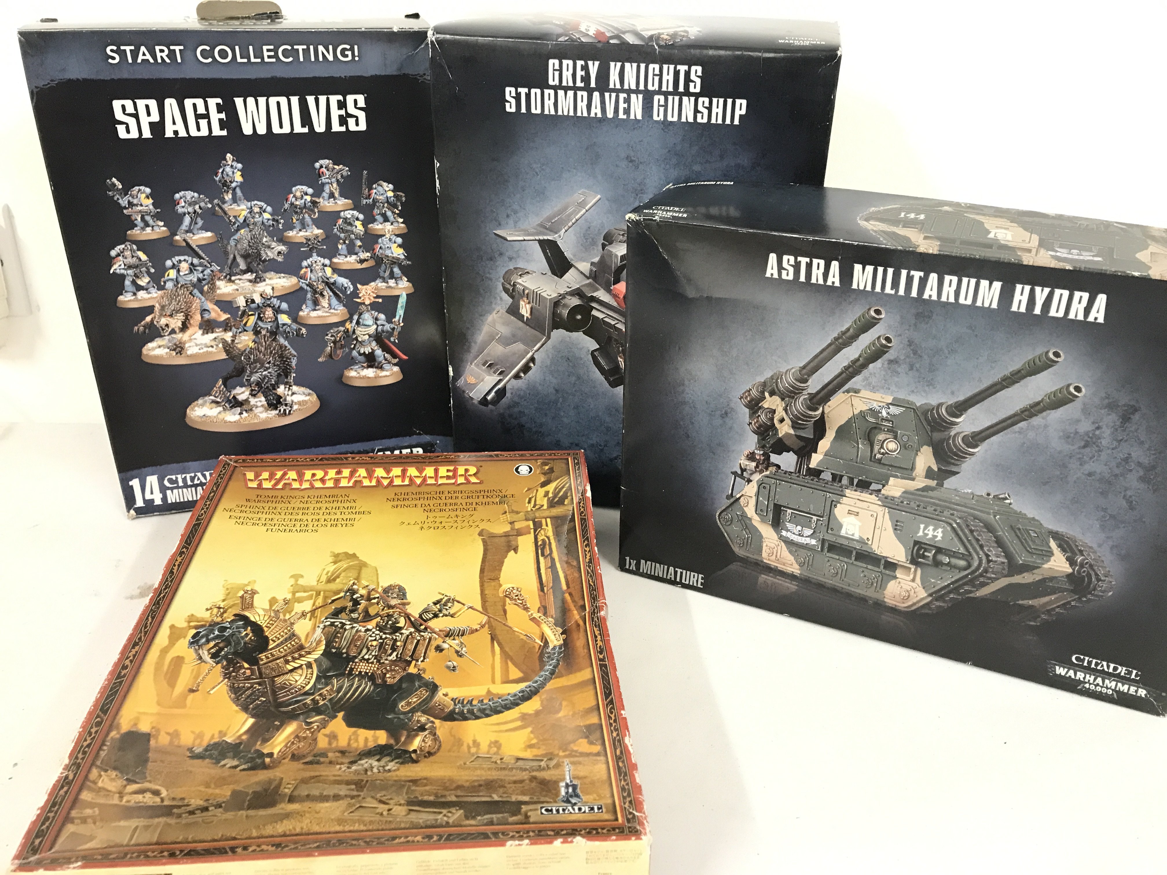 A Collection Of Boxed War Hammer Including Space Wolves. A Grey Knights Stormraven Gunship. A Astra Militarum Hydra And A Tomb Kings Knemrain Warshinx.(4). No Reserve.