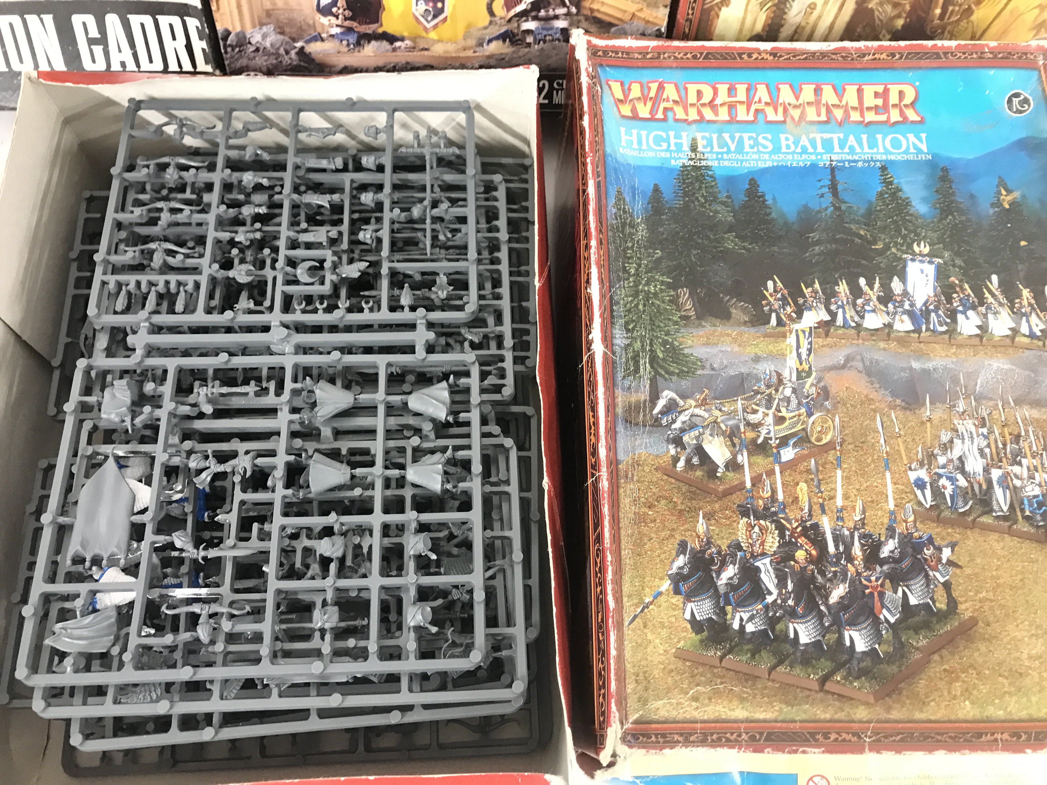 4 Boxed War Hammer Sets. Infiltration Gadre. Knight Questoris. High Elves Battalion and Tomb Kings Battalion. Som have been stated.