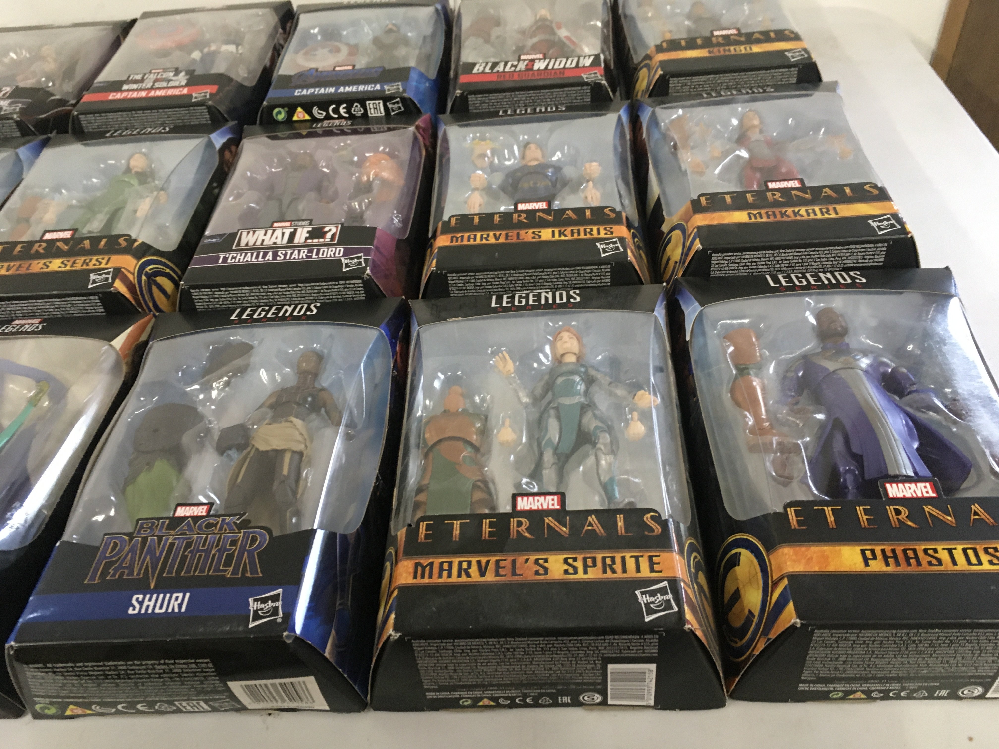 A collection of 15 boxed Marvel Legends figures.