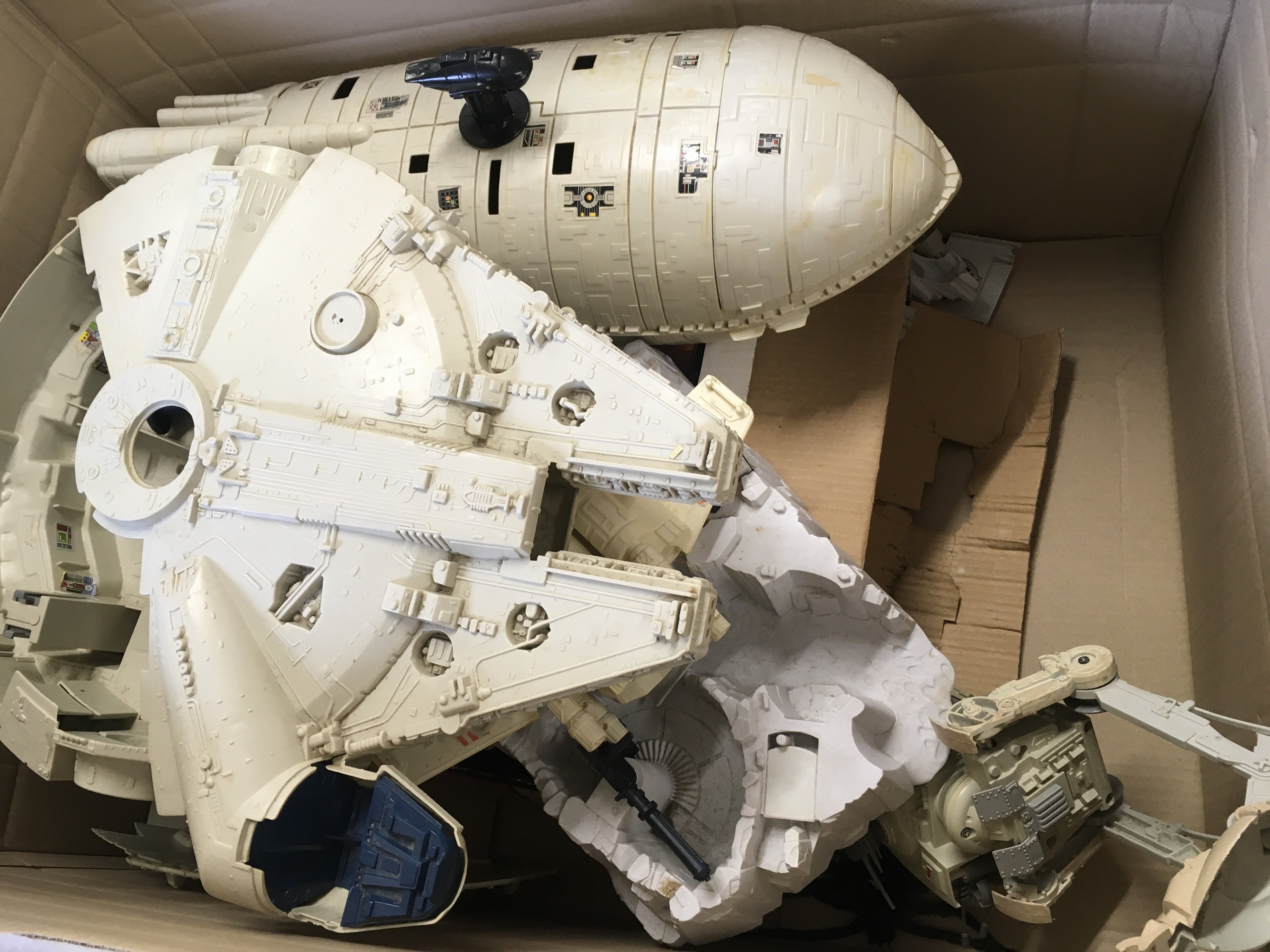 A collection of Star Wars vintage ships plus a boxed Millenium falcon and a loose one..some parts missing.