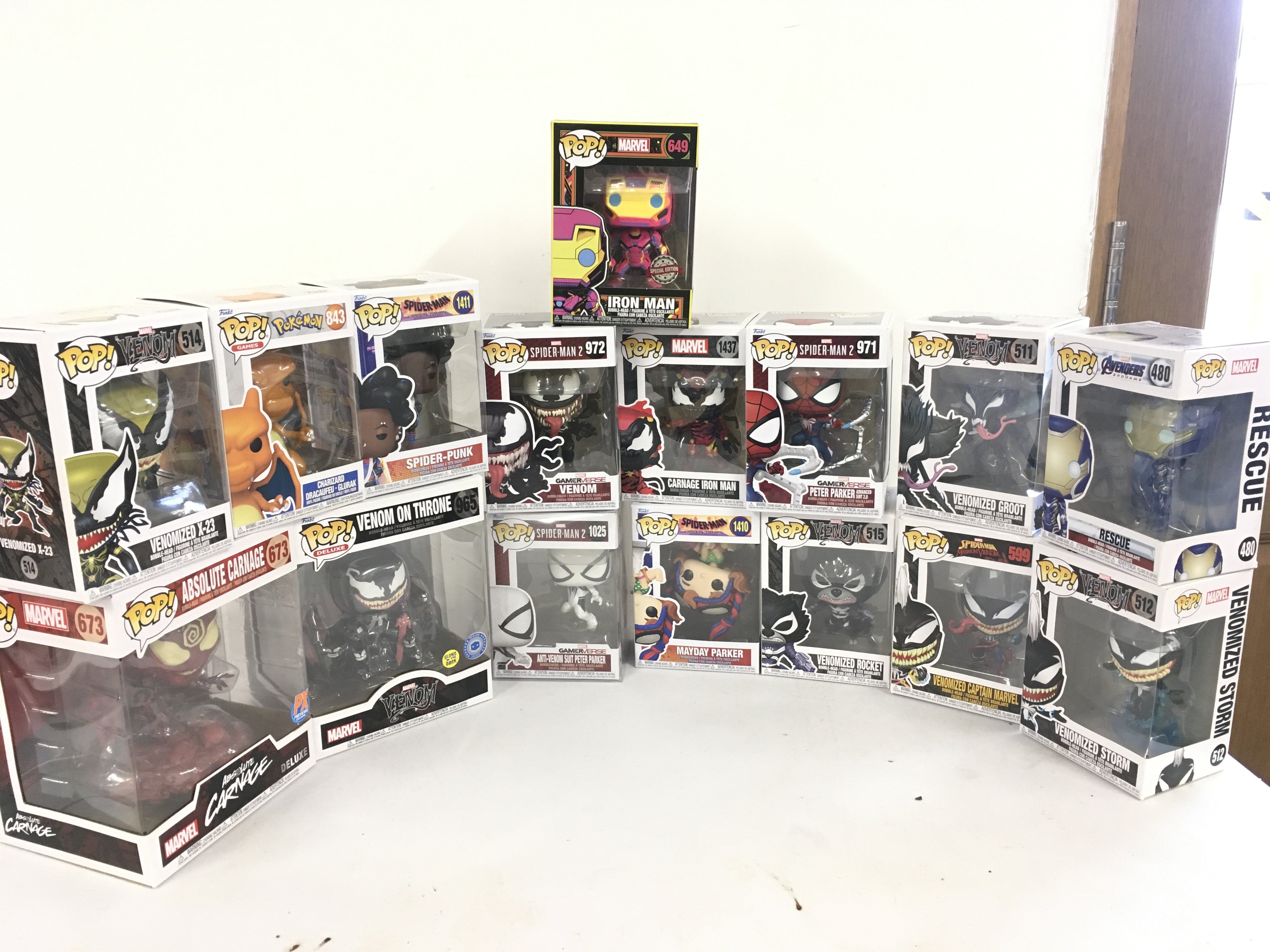 A collection of 16 x boxed funko PoP figures