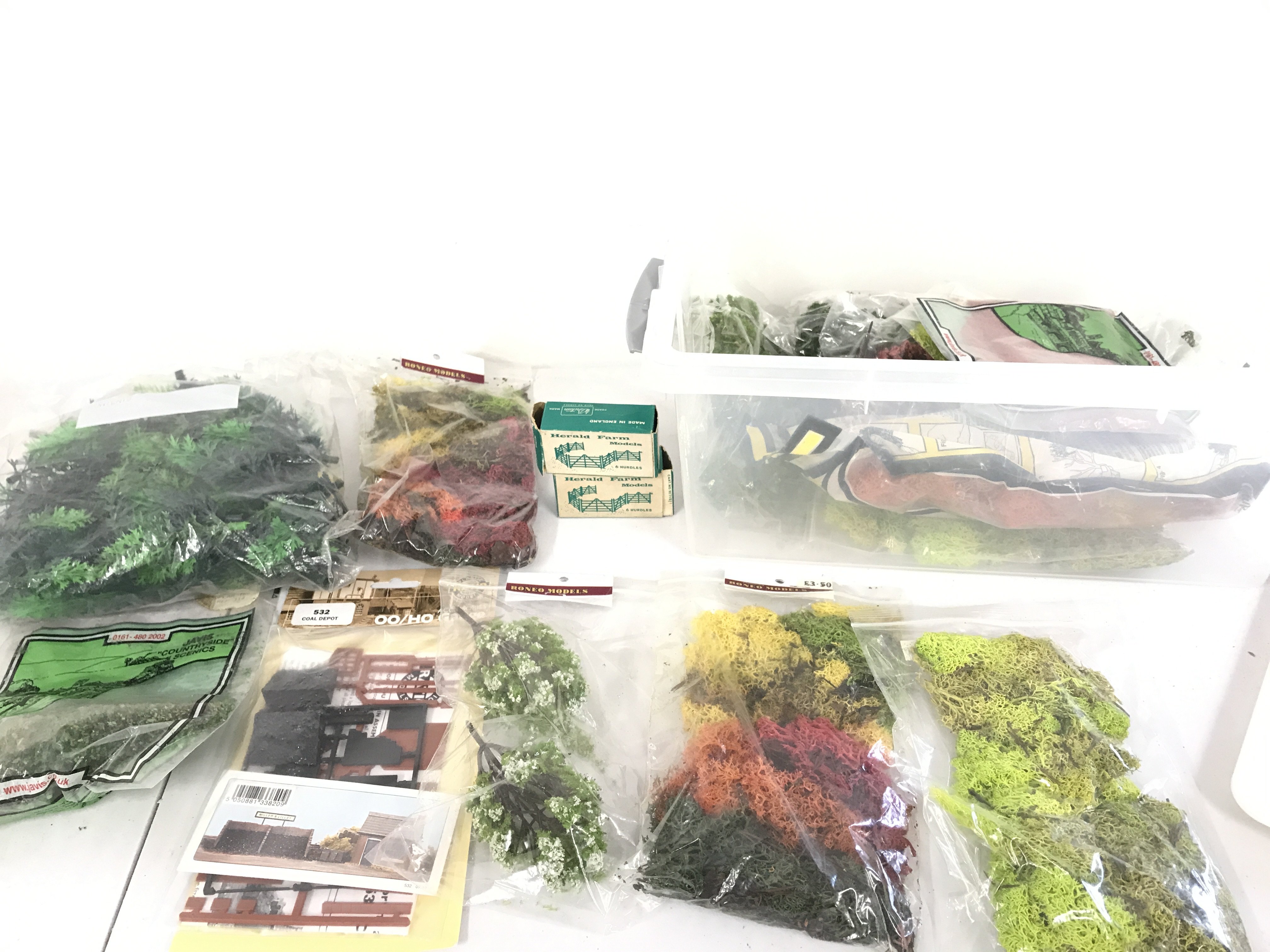 A Collection Of 00 Gauge Theming  And 2 X Britains Boxed hurdles. No Reserve. 