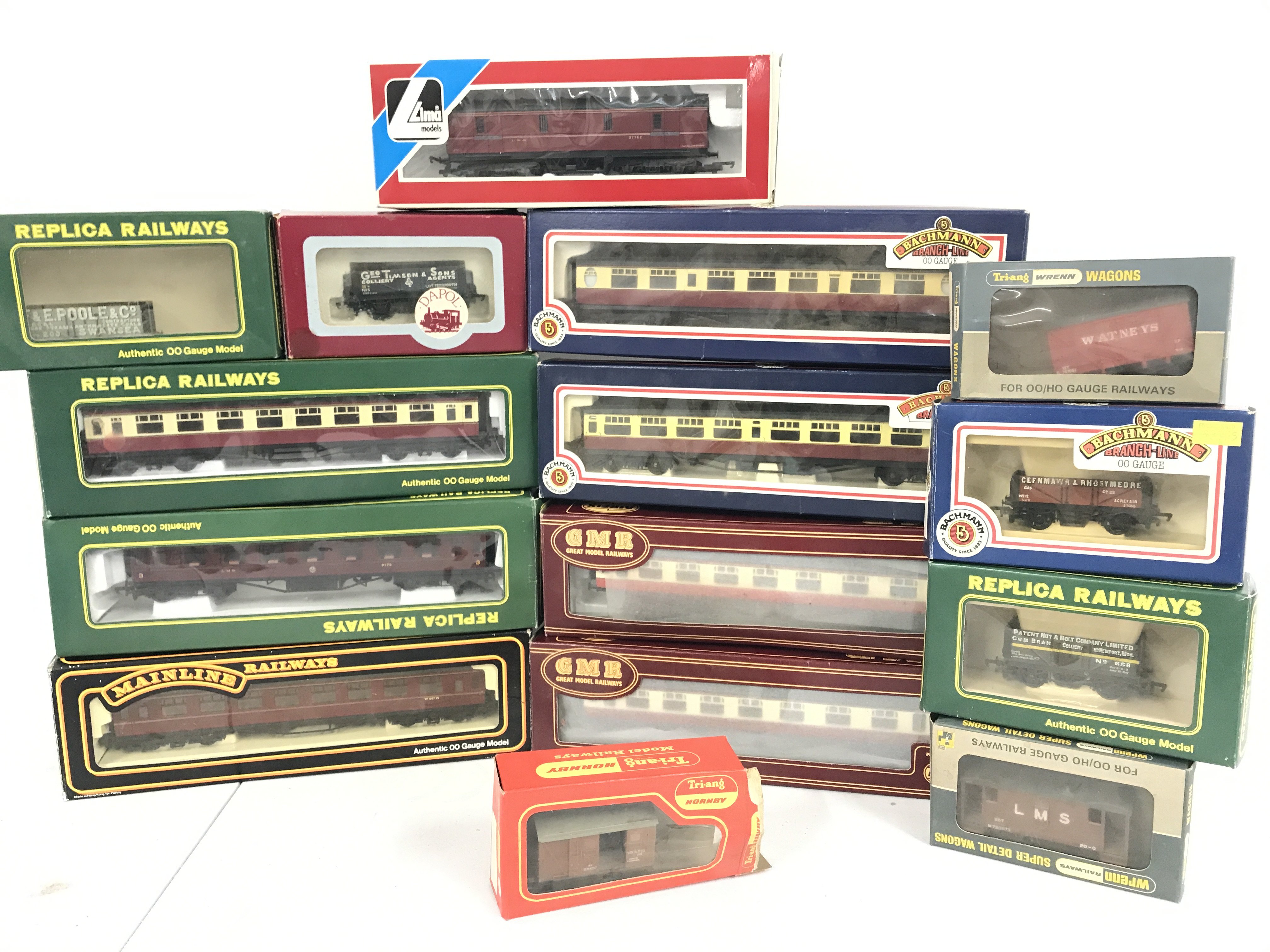 A Collection of Boxed 00 Gauge Coaches And Wagons. Various Makes. No Reserve.