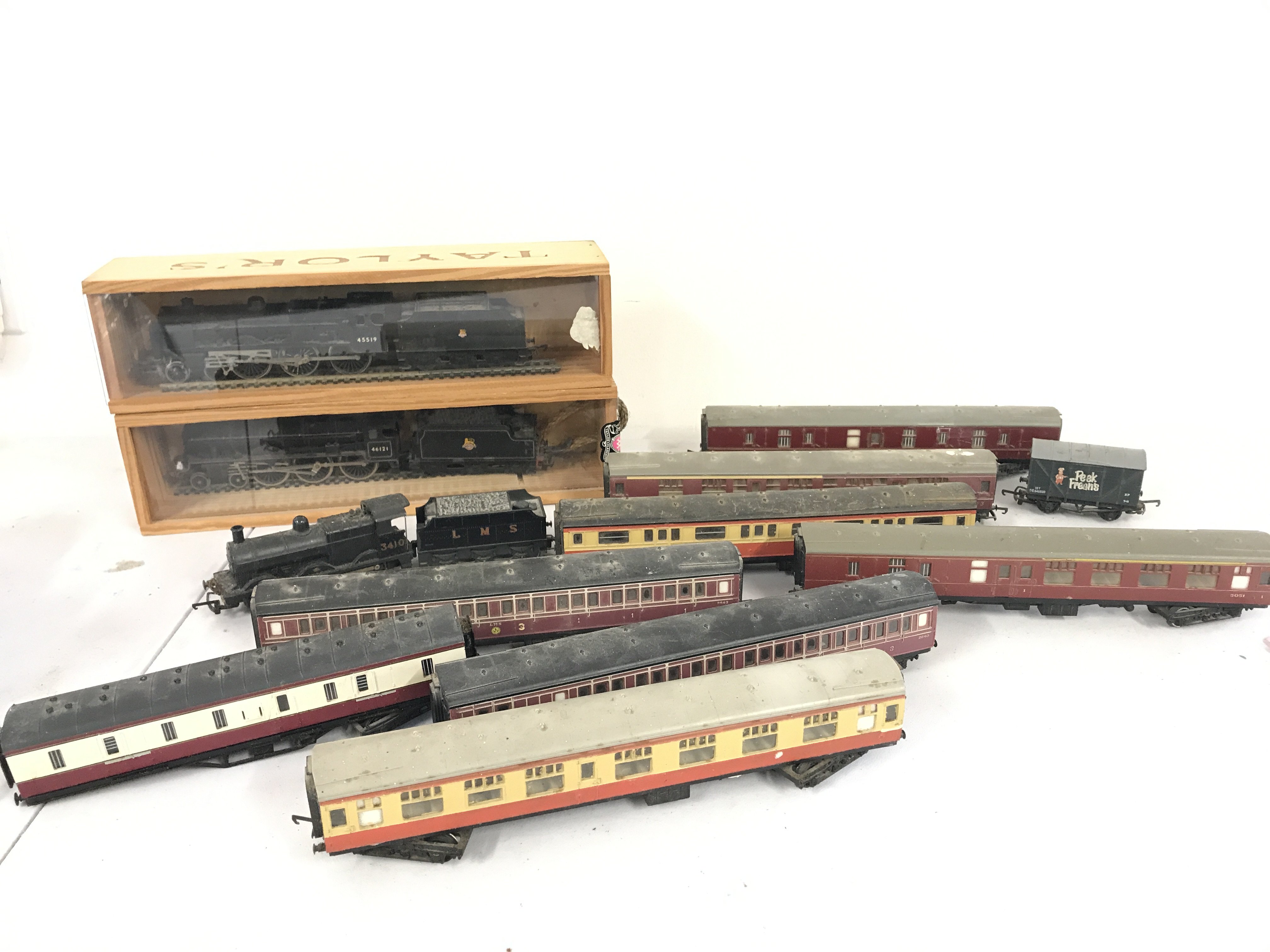 A Box Containing 3 x 00 Gauge Locomotives Coaches And Wagons. No Reserve.