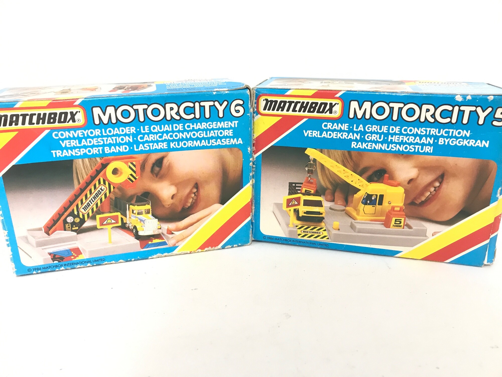 A Boxed Matchbox Motorcity 6. A Conveyor Loader And Motorcity 5 A Crane. No Reserve.
