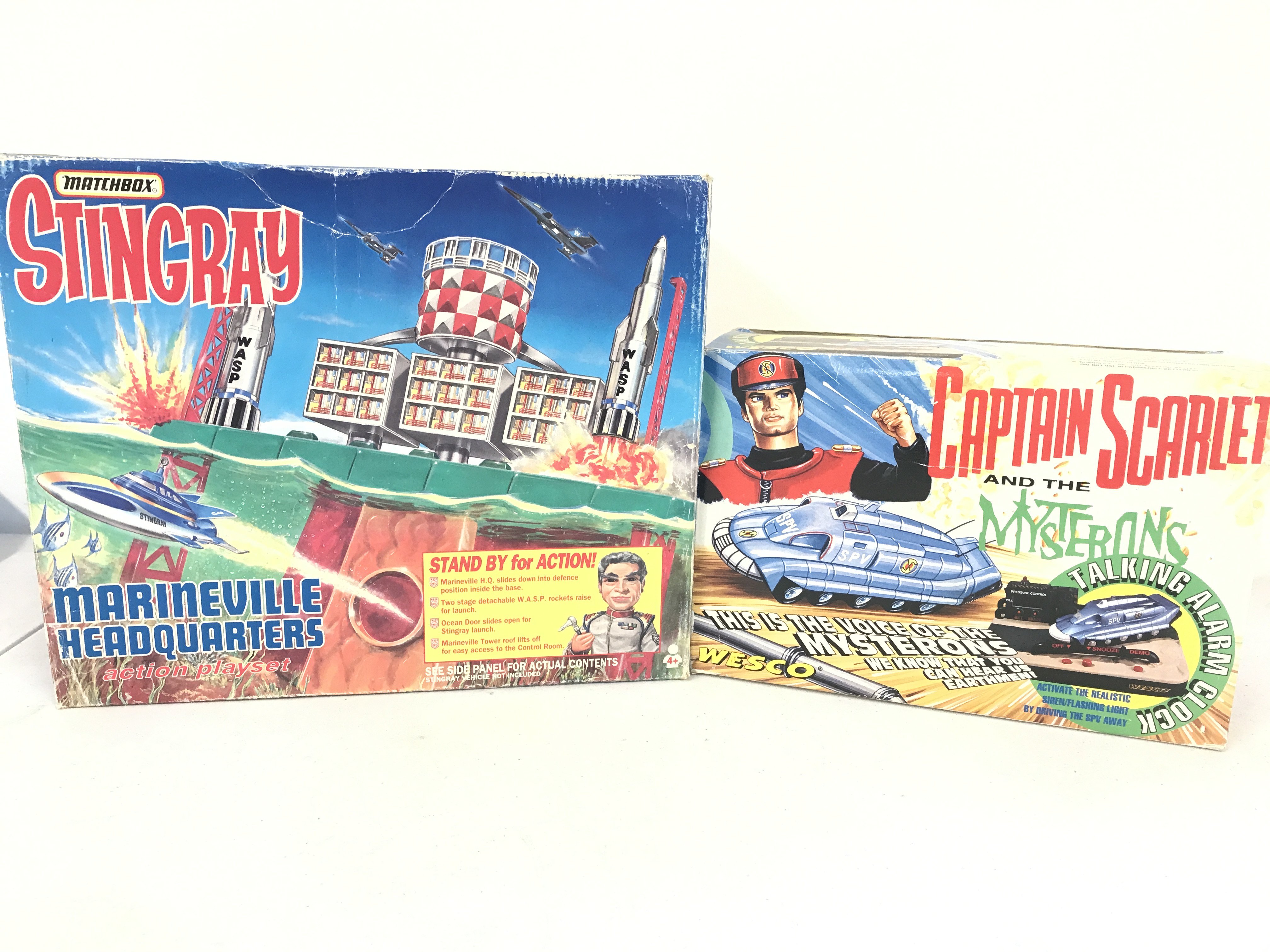 A Boxed Matchbox Stingray Marineville Headquarters (Parts Missing)And A Captain Scarlet Talking Alarm Clock. No Reserve. (2).