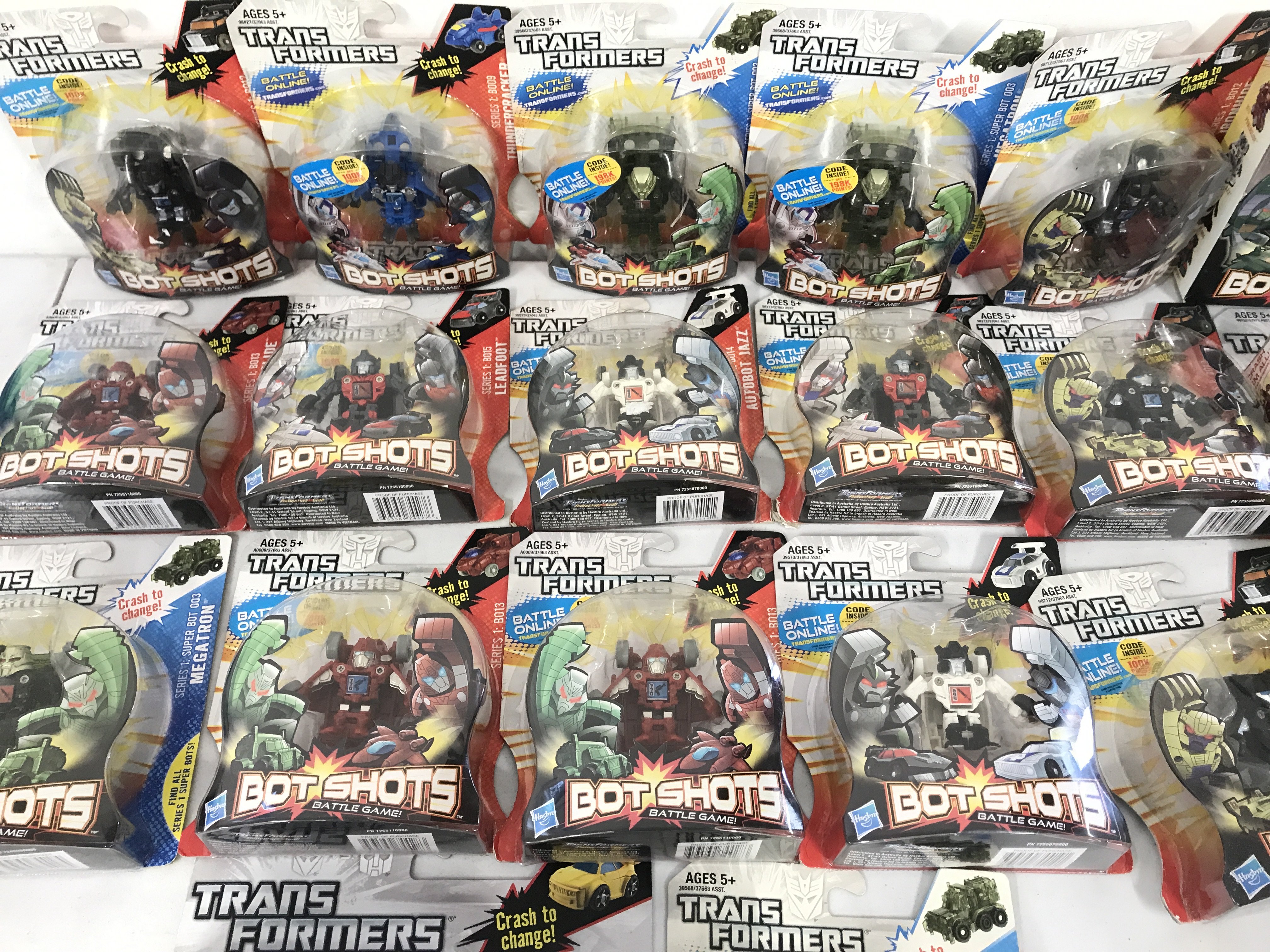 A Collection Of Boxed Transformers Bot Shots. No Reserve.