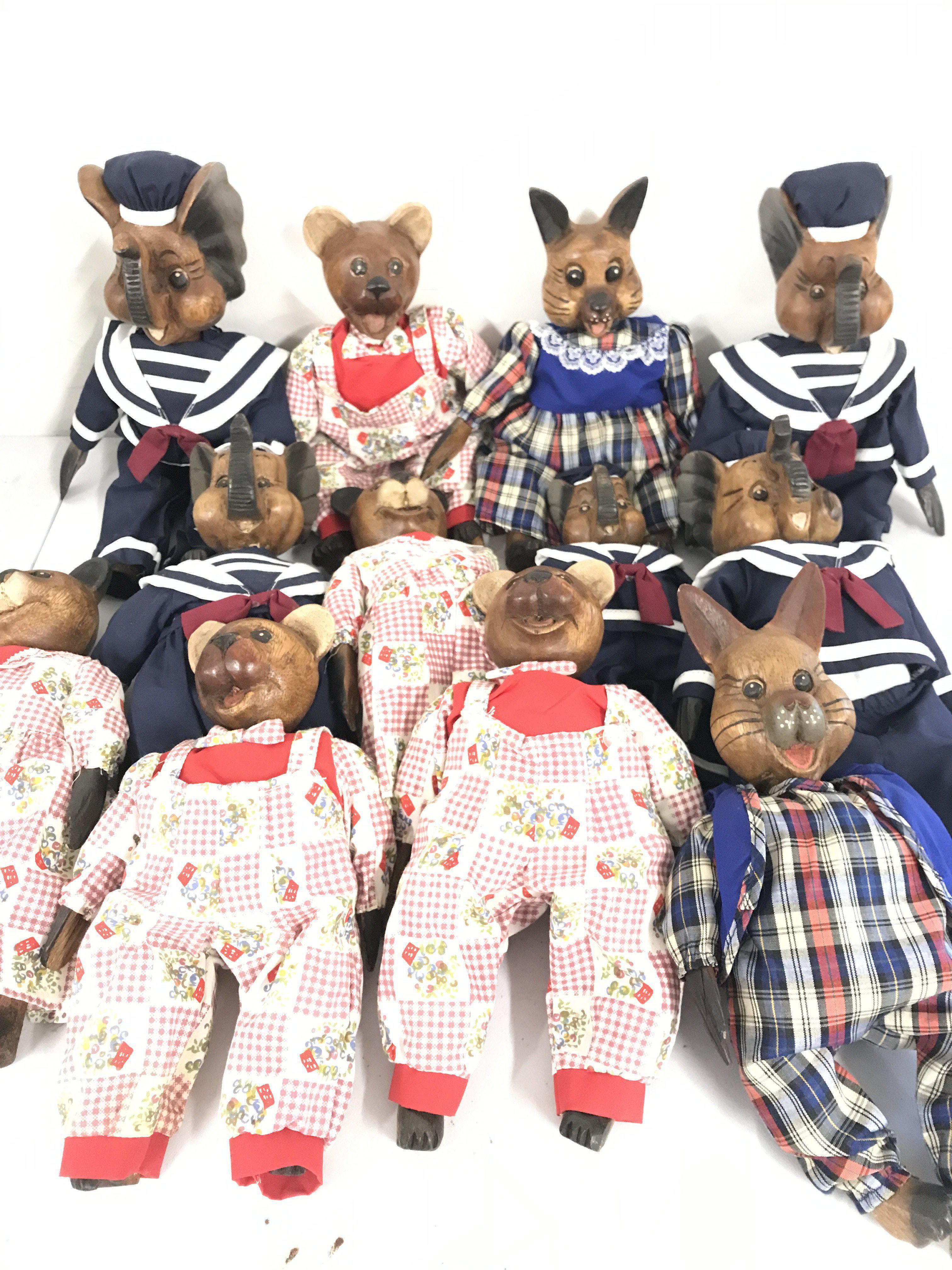 A Box Containing Wooden Animal Dolls. No Reserve.