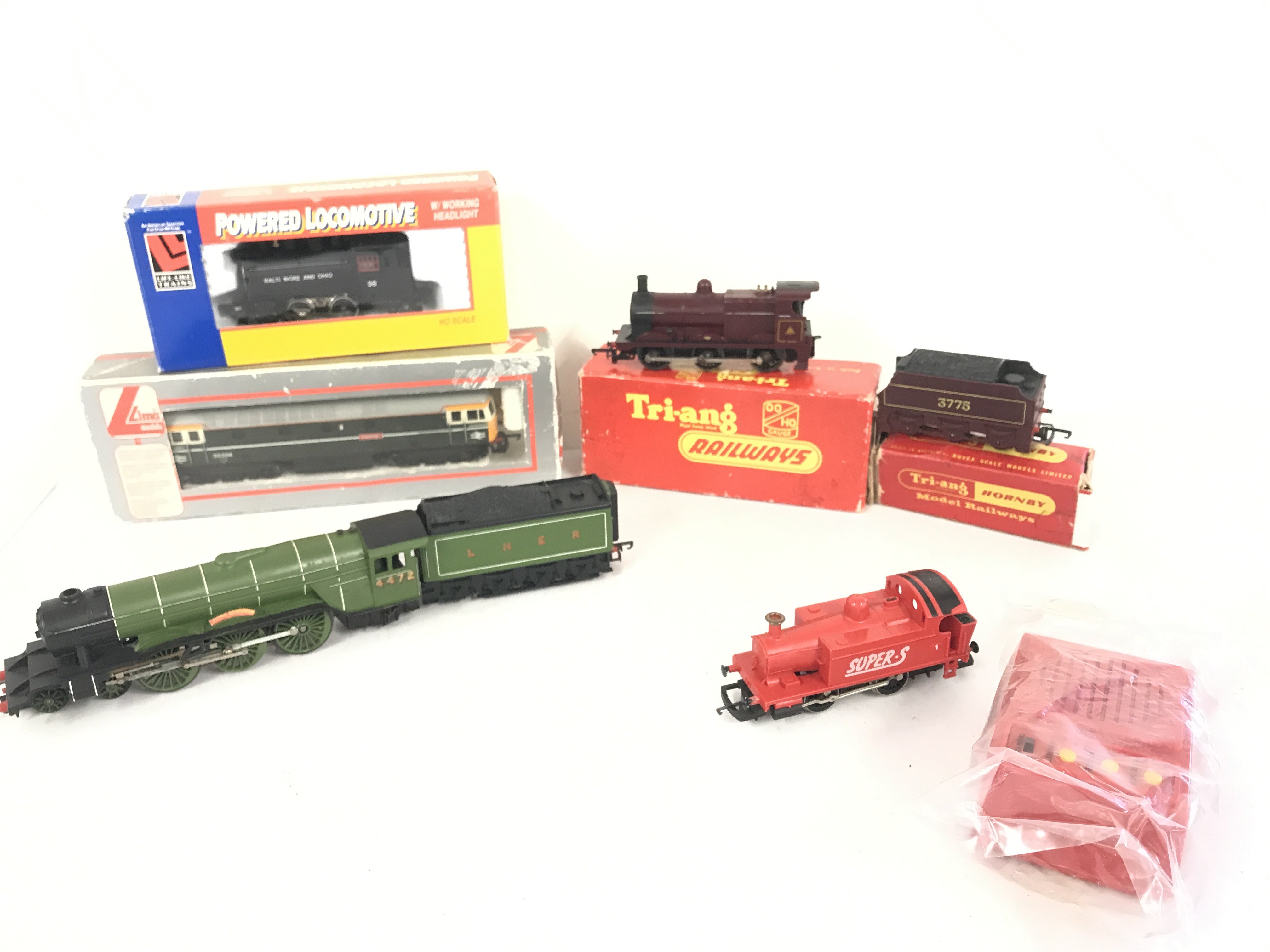 5 Boxed And Loose 00/H0 Gauge Locos Including A Flying Scots Man.