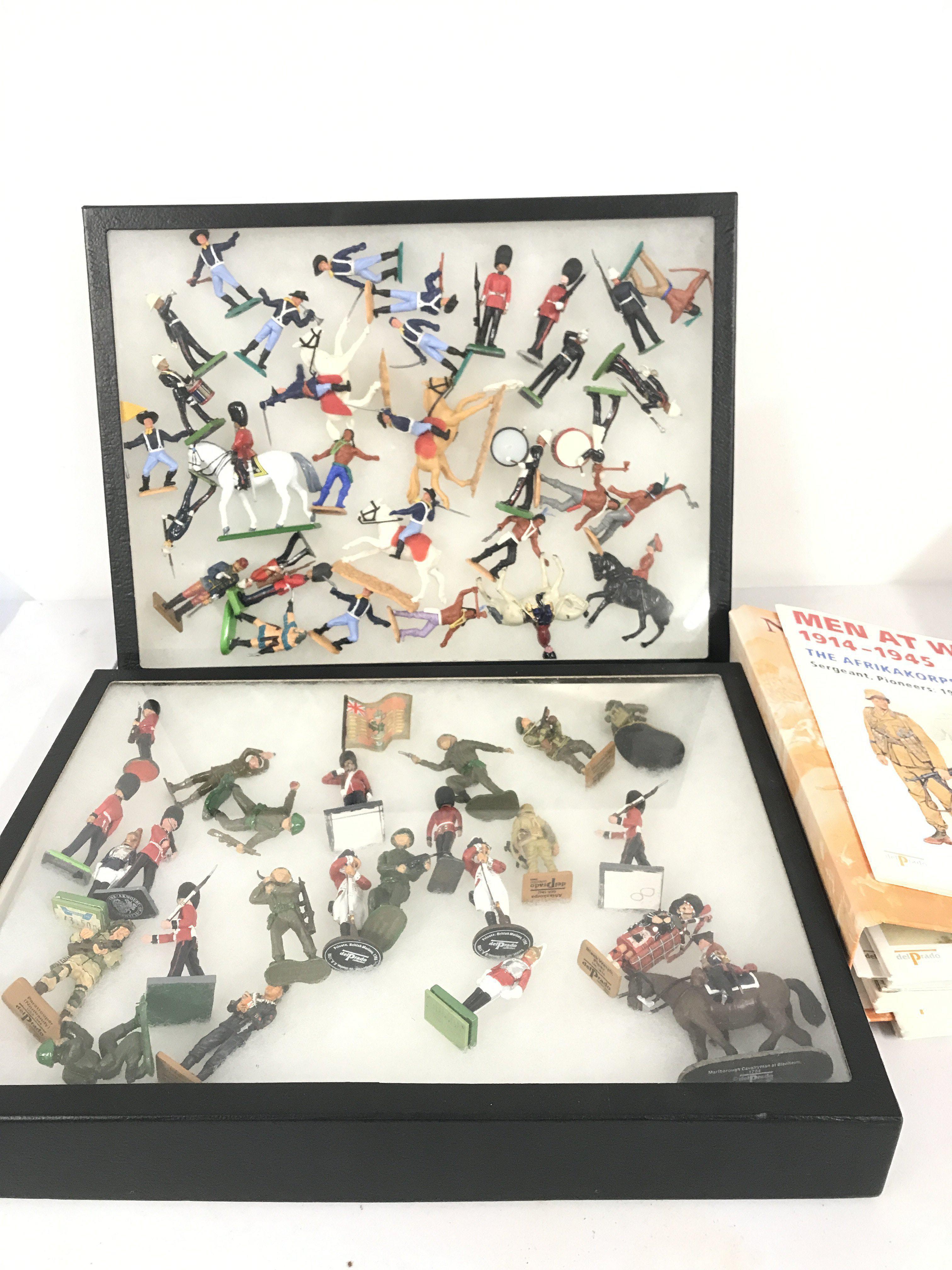 2 X Cases Containing Metal And Plastic Soldiers. Including Delprado. Crescent. Britains. Etc.