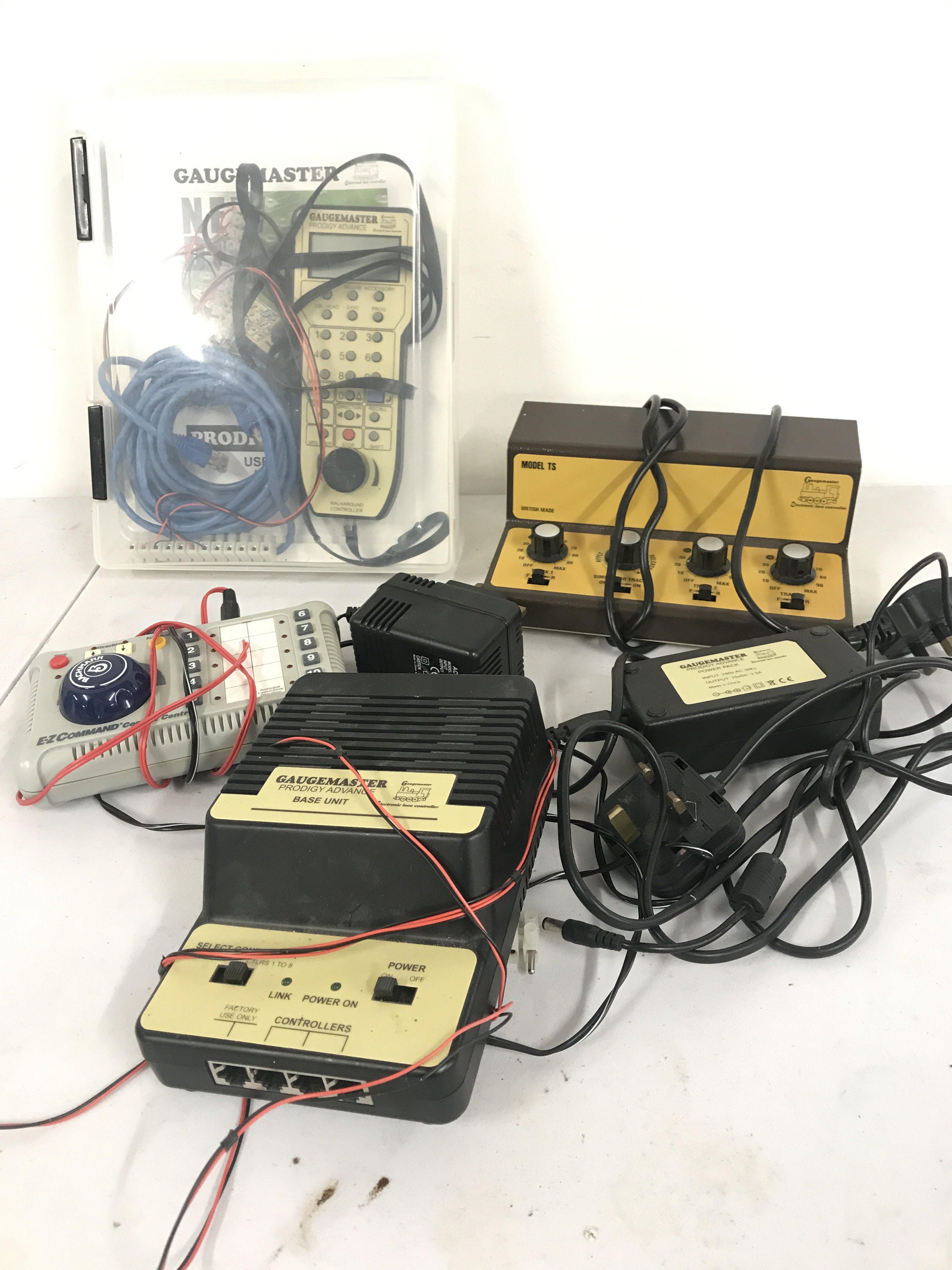 A Collection Of Model Railway Transformers Etc And A Collection Of Track. No Reserve.