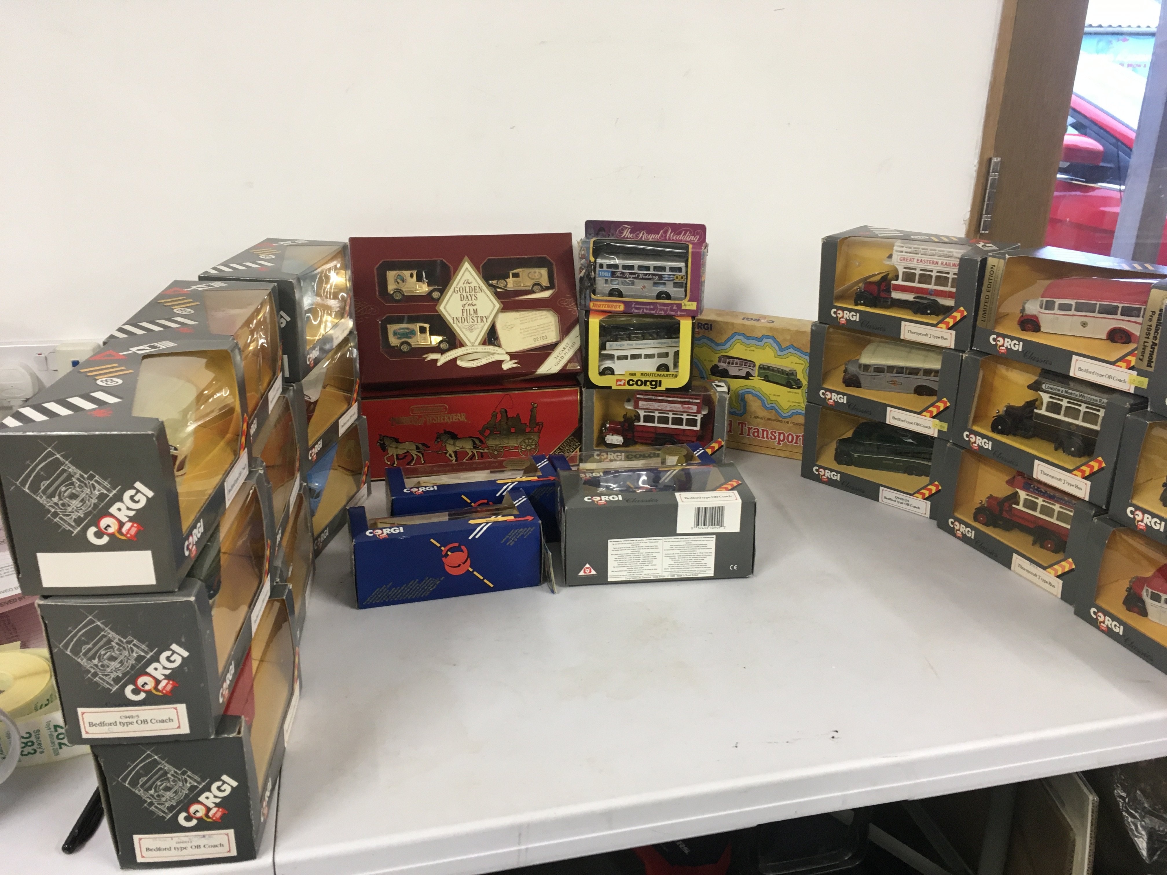 A collection in excess of 25 of boxed diecast model vehicles mainly buses and coaches by Corgi with 3 by Matchbox- Lledo.  No reserve