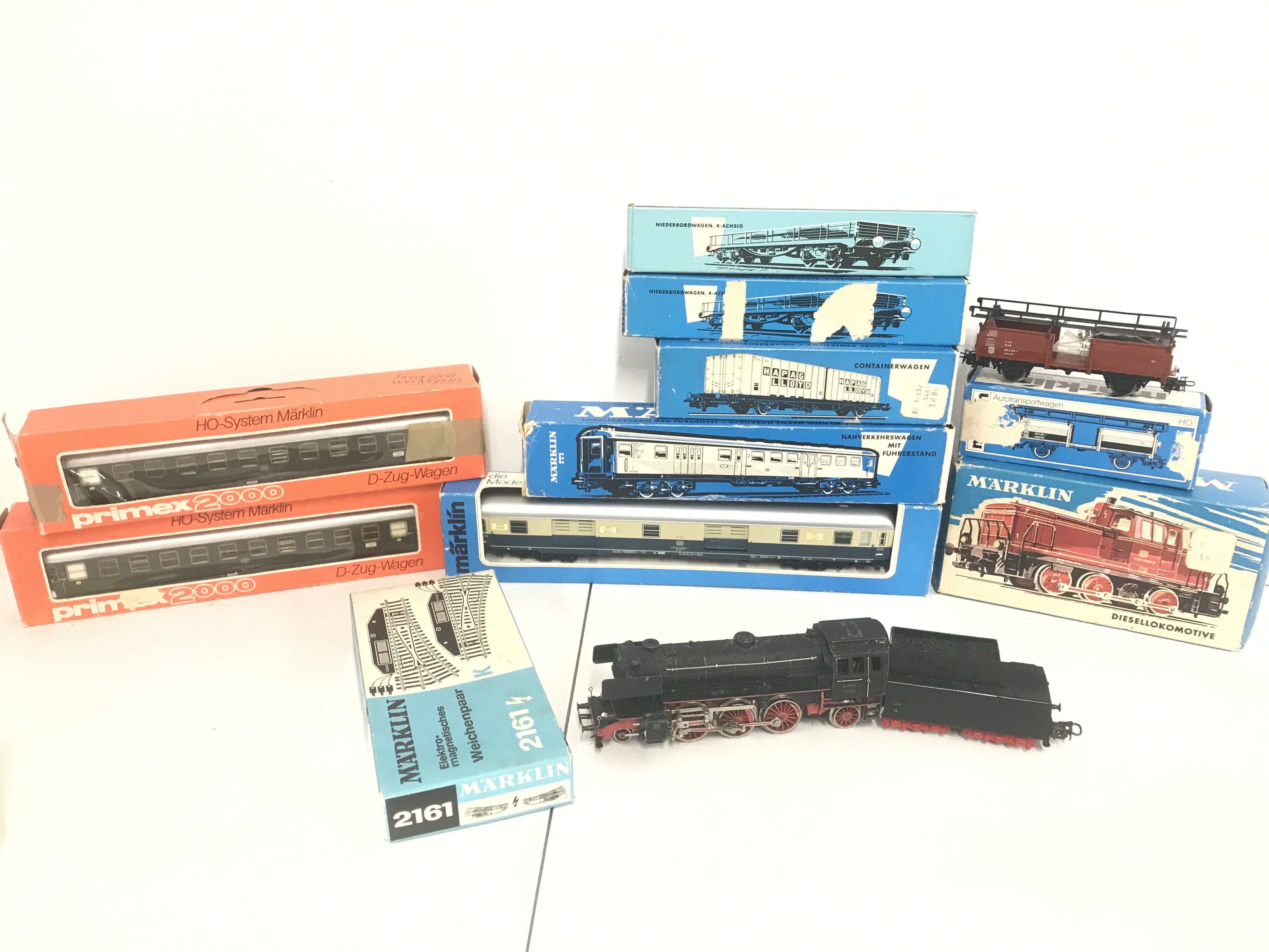 A Collection Of Boxed And Loose Marklin H0 Gauge Locos. Coaches And Wagons.