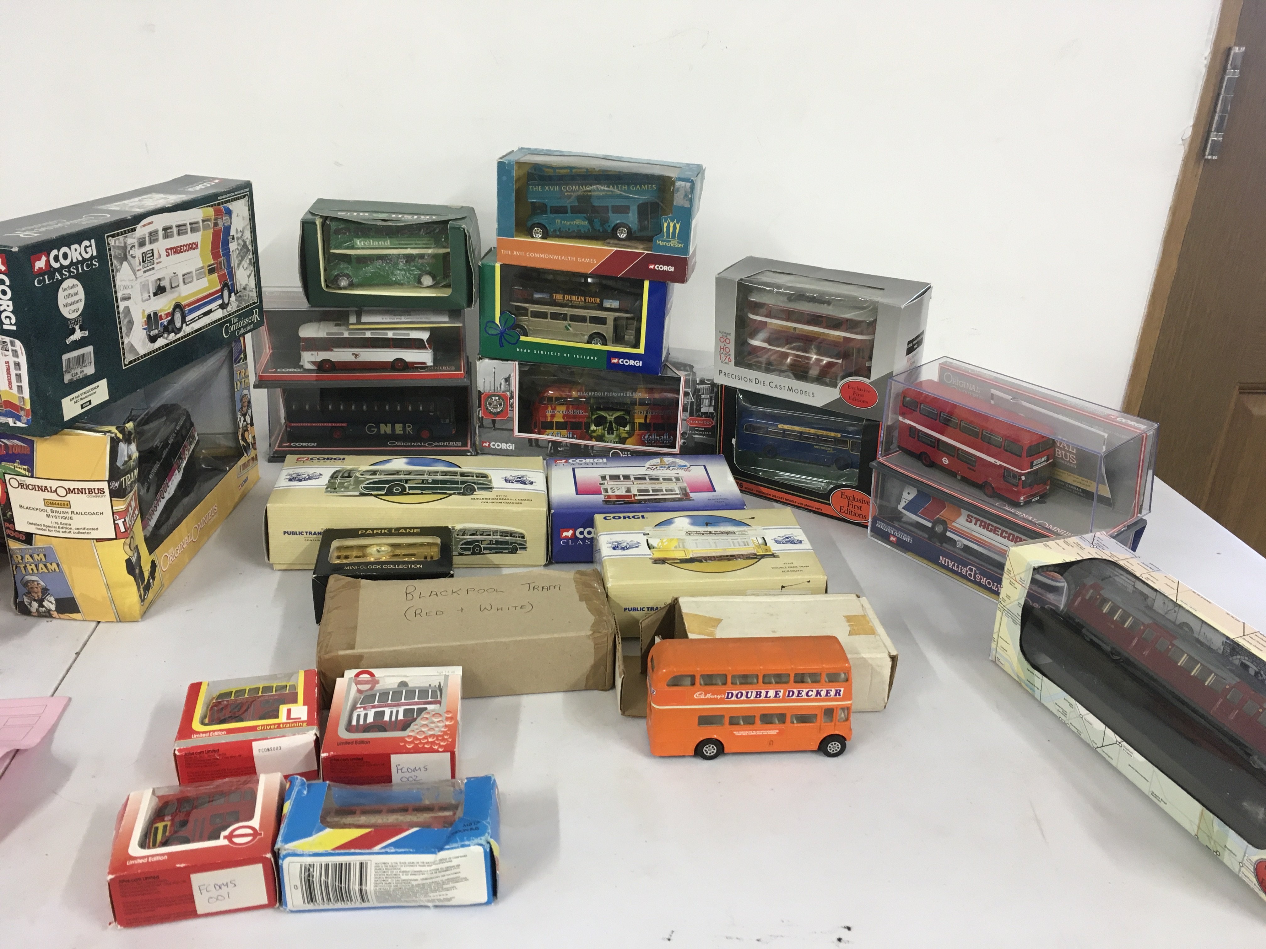 A collection in excess of 20 boxed model diecast vehicles mainly .busesâ€¦.coaches. No reserve 
