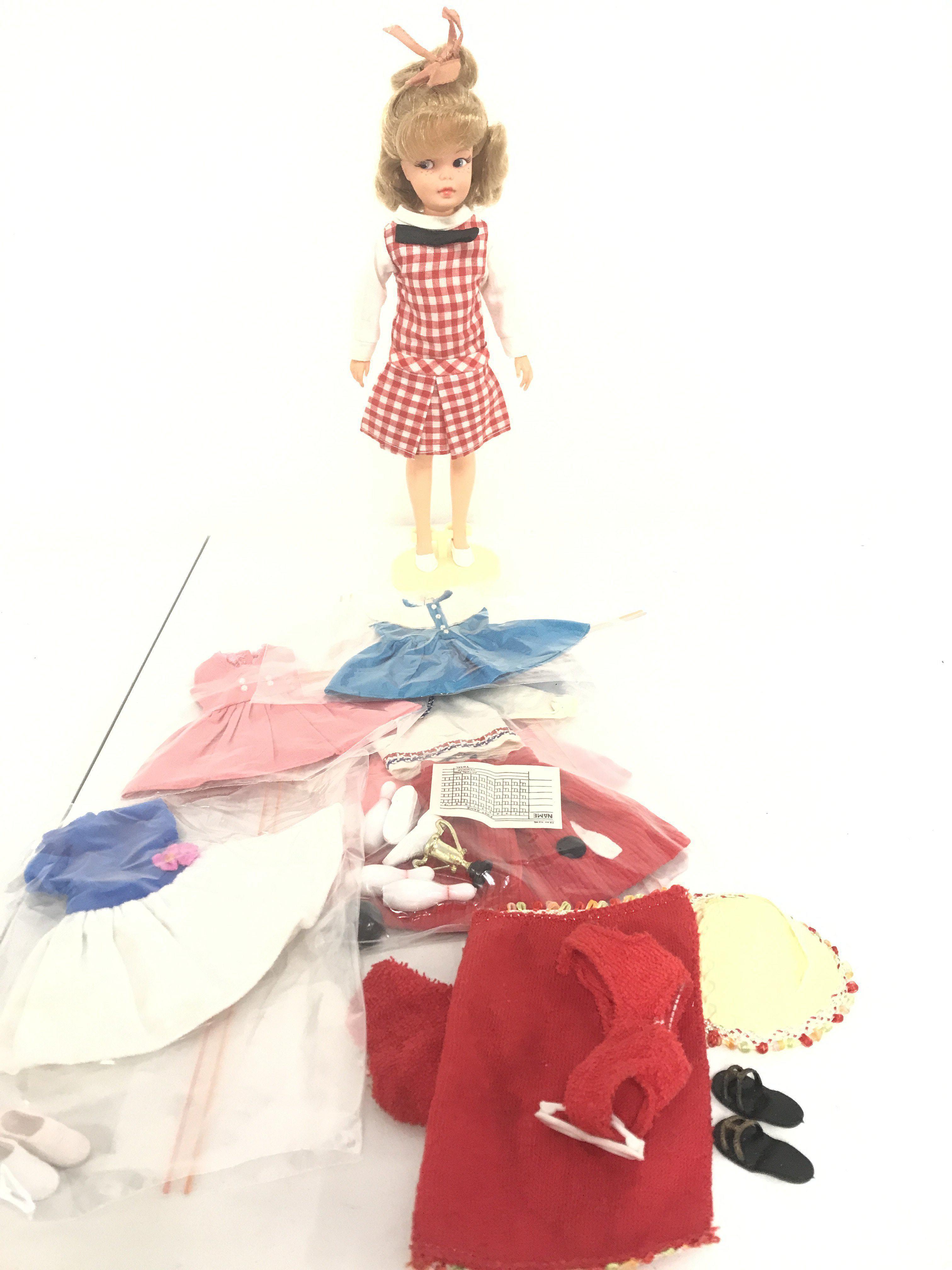 A Ideal Toys Corporation Pepper Doll. With Extra Clothes And Stand.