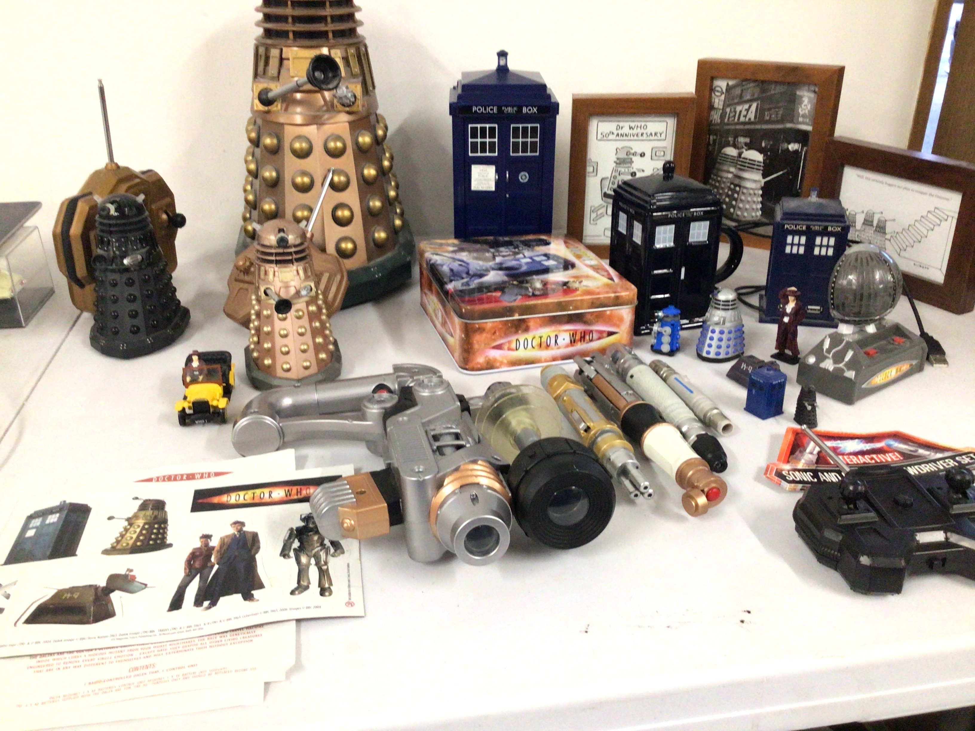 A collection of Dr.Who related items including remote control Dalek..sonic screwdrivers..Tardis..framed pictures and other items. No reserve