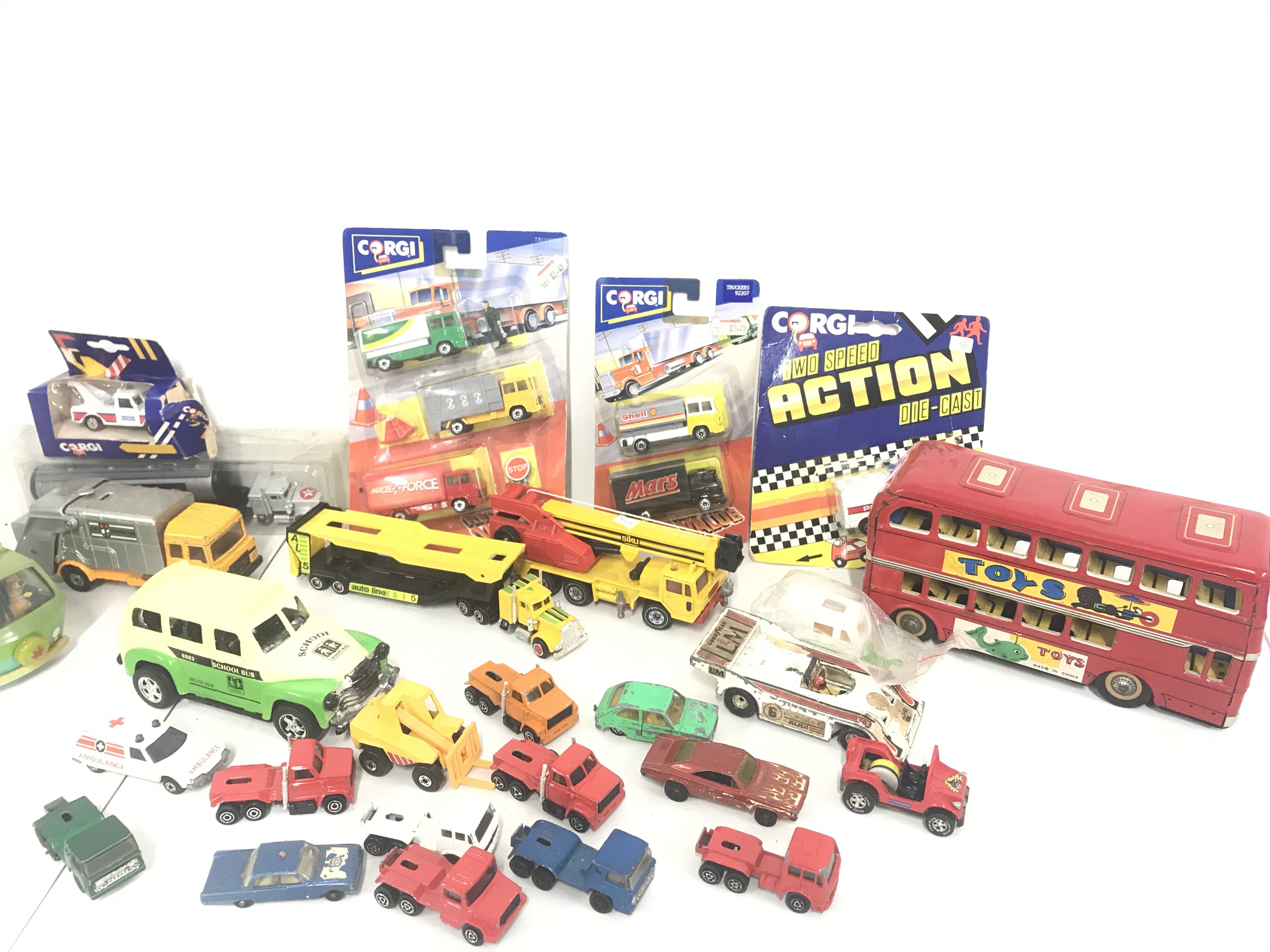 A Collection Of Boxed And Loose Diecast Including A Tin Plate Bus. No Reserve.
