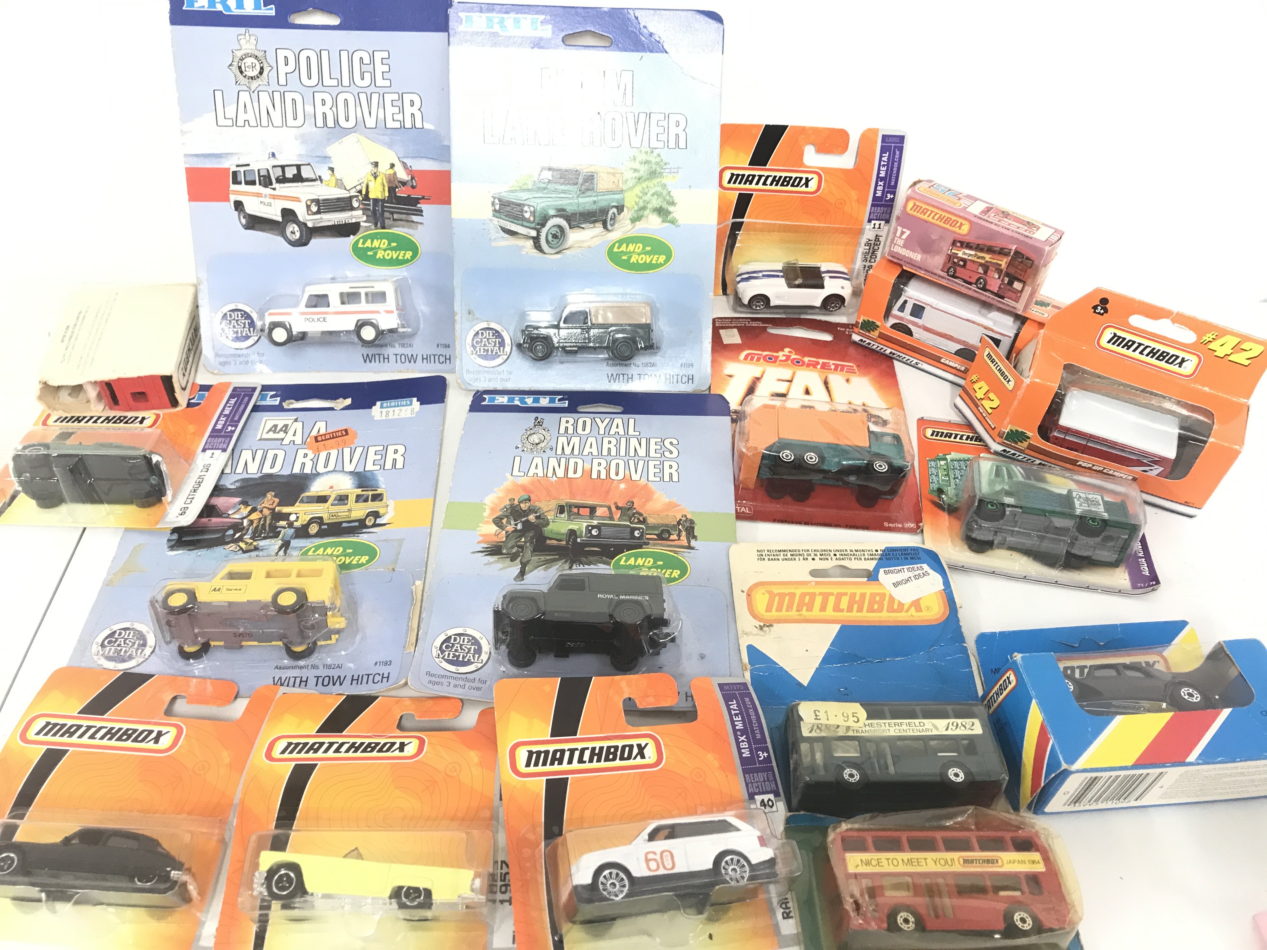 A Collection Of Carded And Boxed Matchbox And Ertl Diecast. No Reserve.