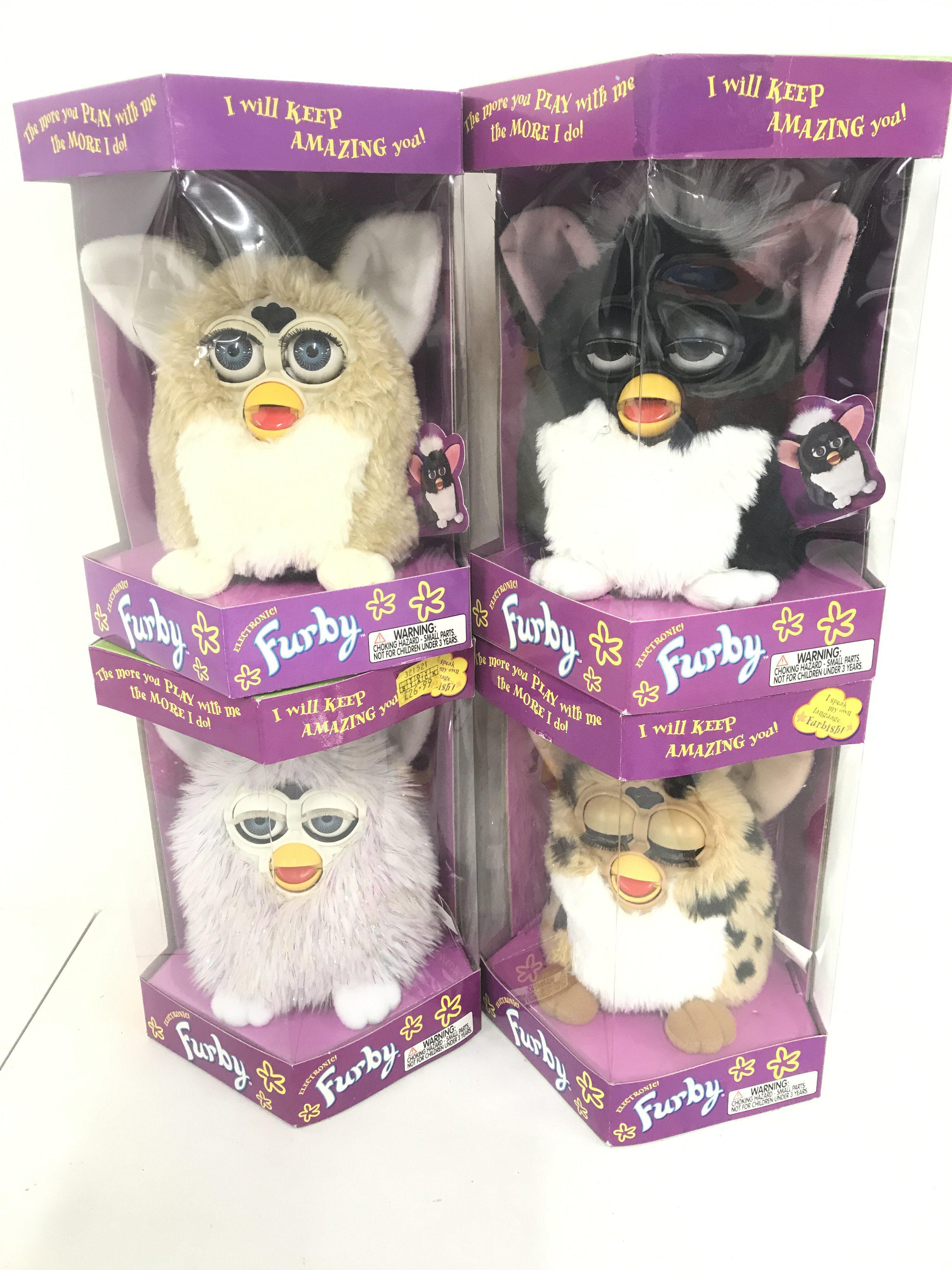 4 Boxed And Sealed Tiger/Hasbro Furbys. Including Skunk. Giraffe. Champagne And Bear Brown.