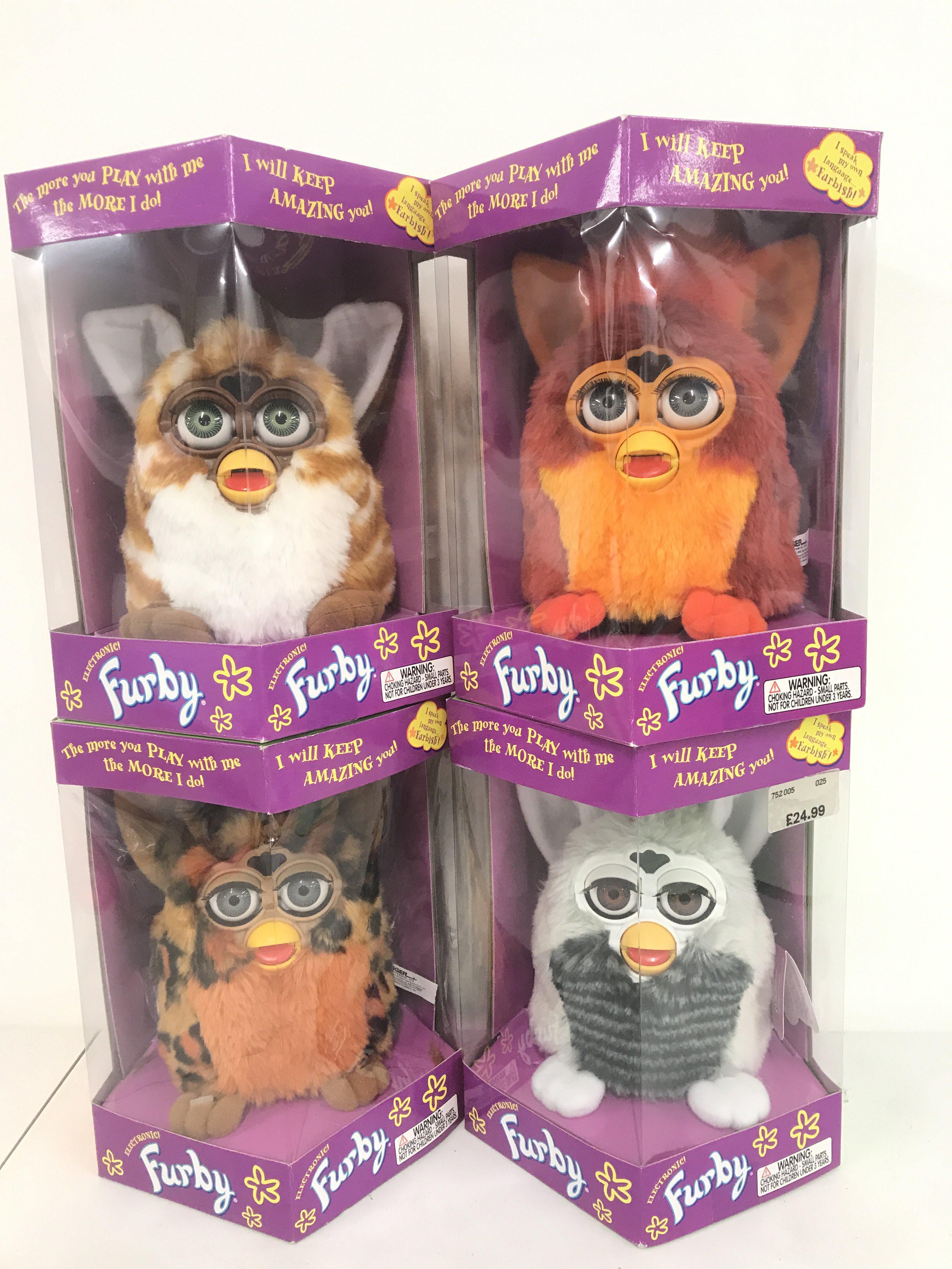 4 Boxed And Sealed Tiger/Hasbro Furbys. Including Rooster. Raccoon. Leopard And Gold Stripes.