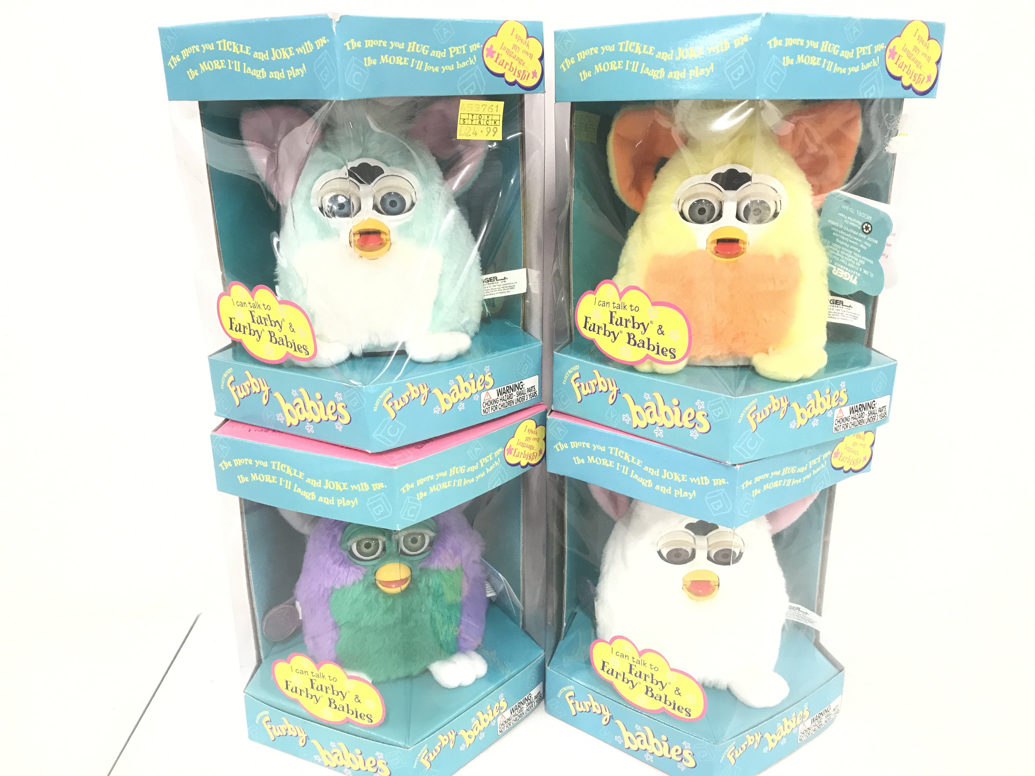 4 Boxed And Sealed Tiger/Hasbro Furby Babies. Including Snowy. Sunny Yellow. Very Purple And Mint Green.