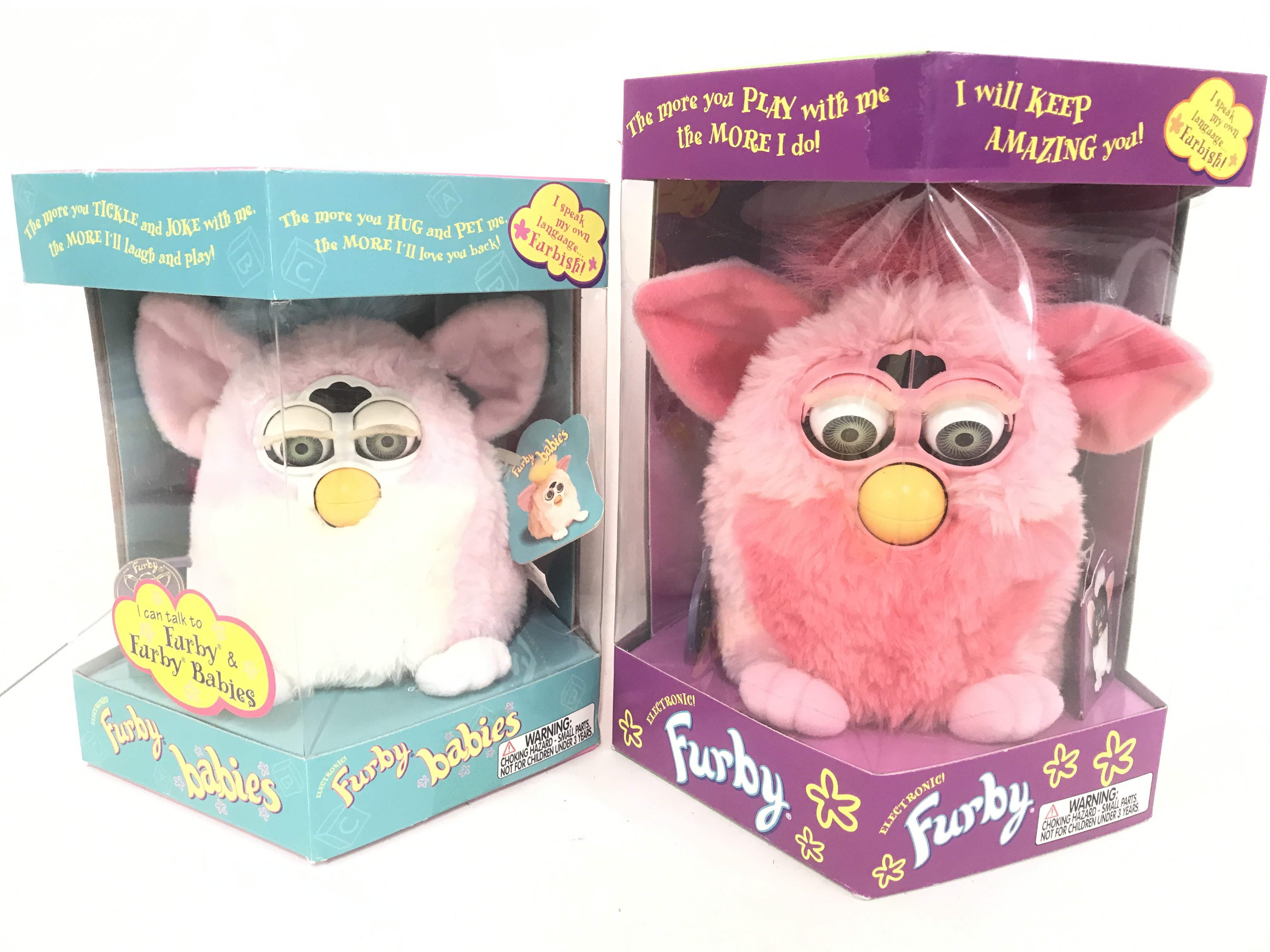 A Boxed Tiger/Hasbro Furby Babie And A Boxed Furby. Both Have Been Opened.