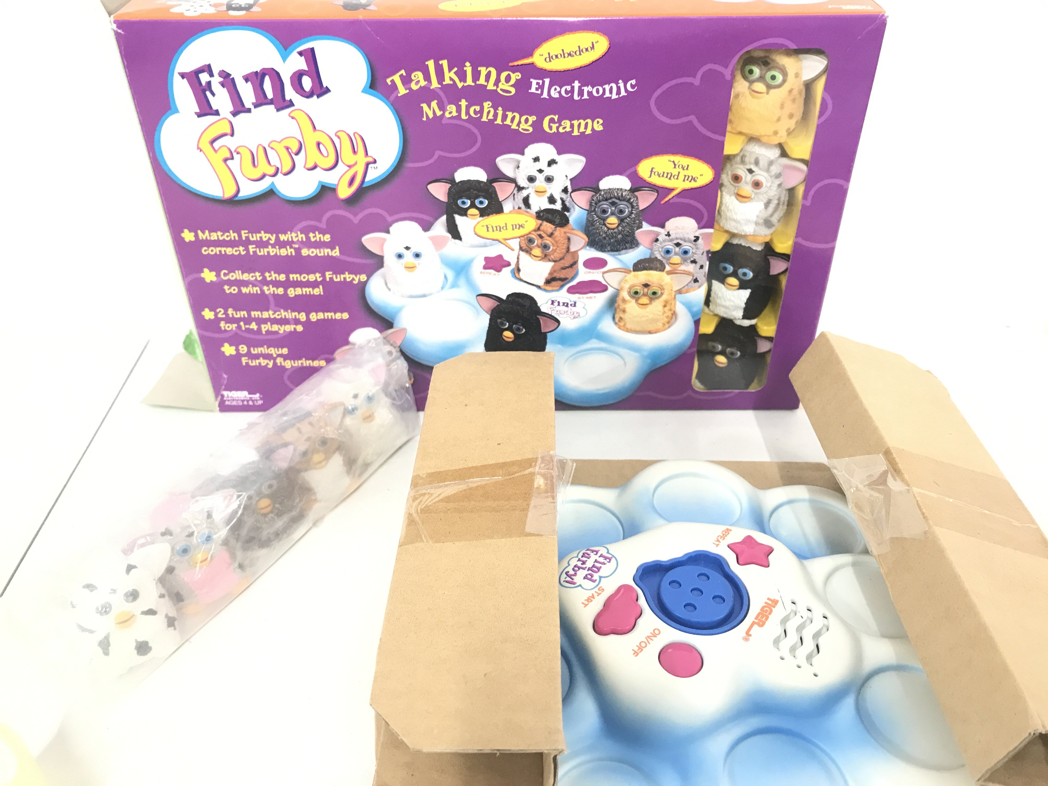 A Boxed Tiger Find Furby Talking Electronic Game.
