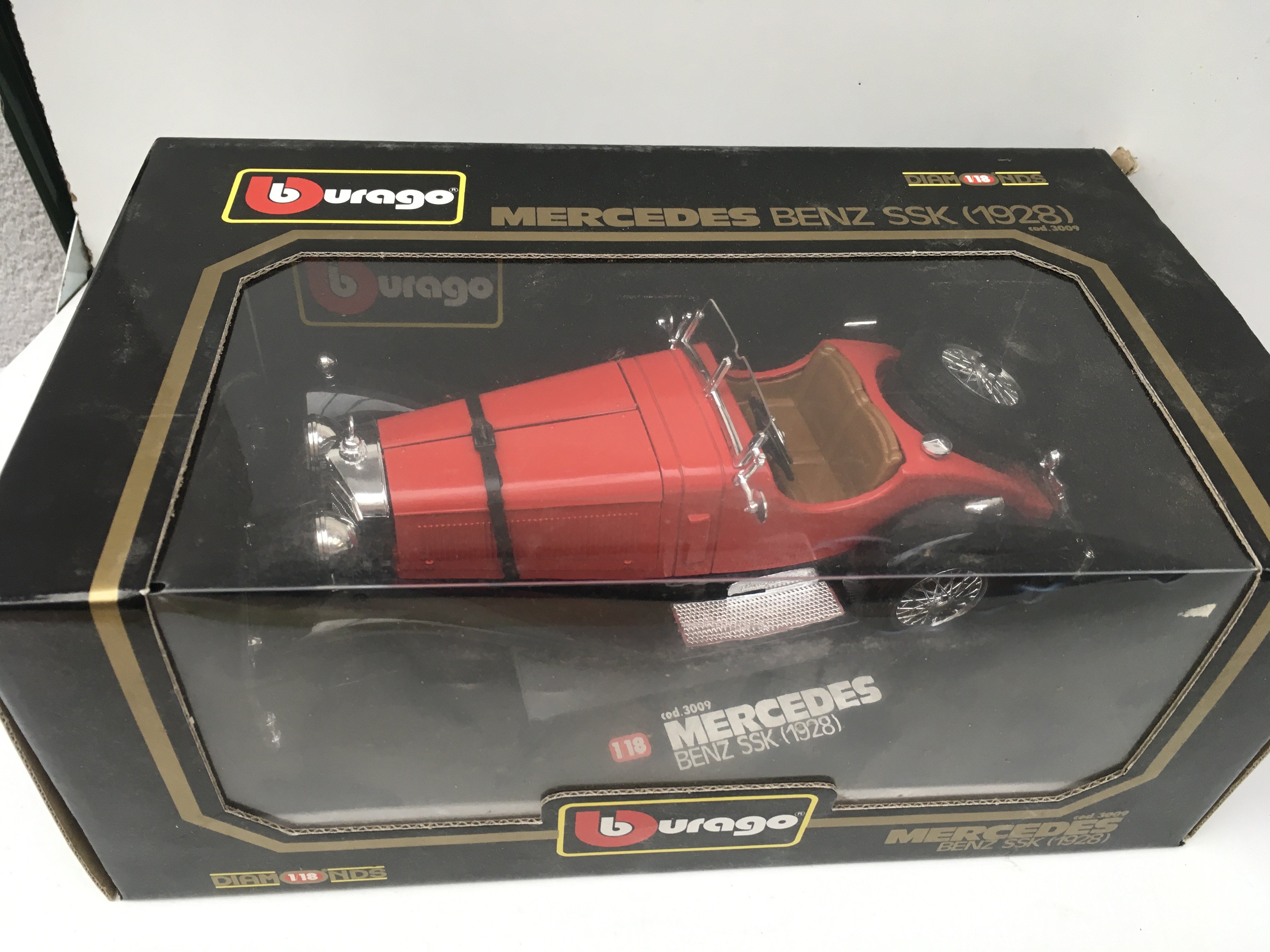 2x boxed diecast model cars by burago featuring a 1928 Mercedes Benz SSK and a 1934 Bugatti type 59. No reserve.