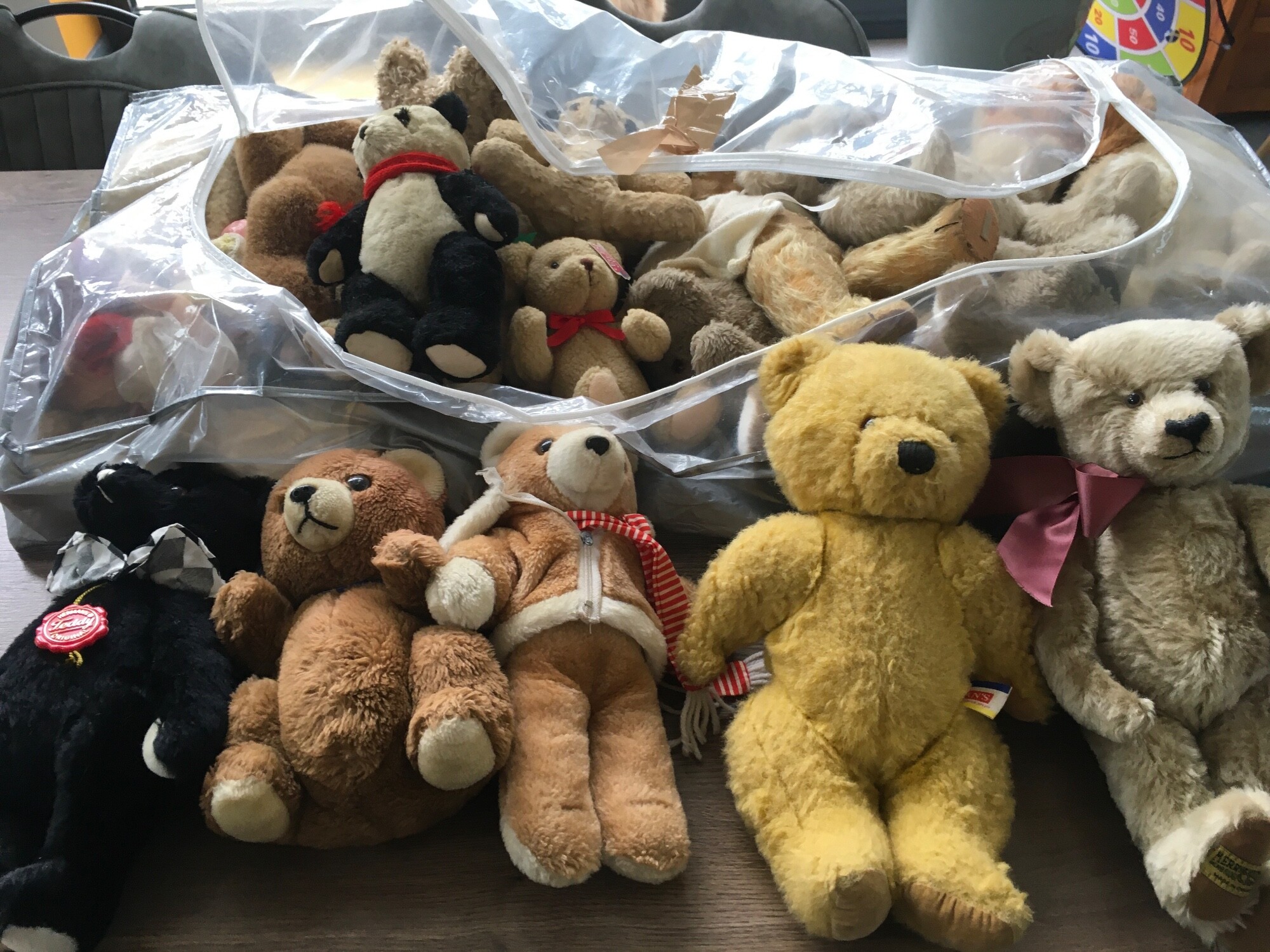 A collection in excess of 15 assorted size teddy bears by numerous manufactures and vintages including Herman..Chad Valley..Clemens and others.   No reserve