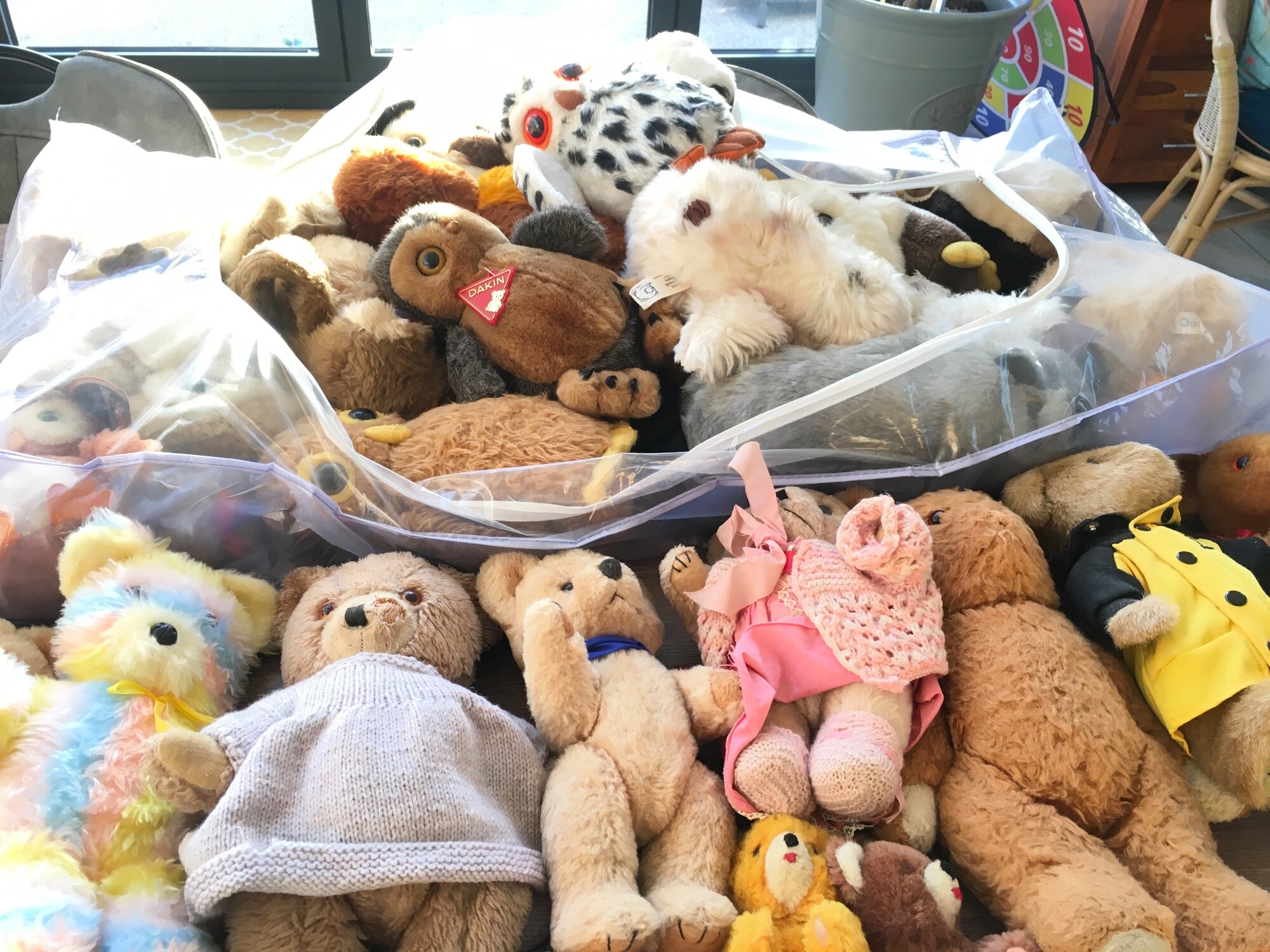 A collection in excess of 20 plush toys comprising teddy bears and Owls of varying ages by manufacturers including Merry Thought, Darin, Vera Small and others. Includes a wind up musical teddy bear.  No reserve