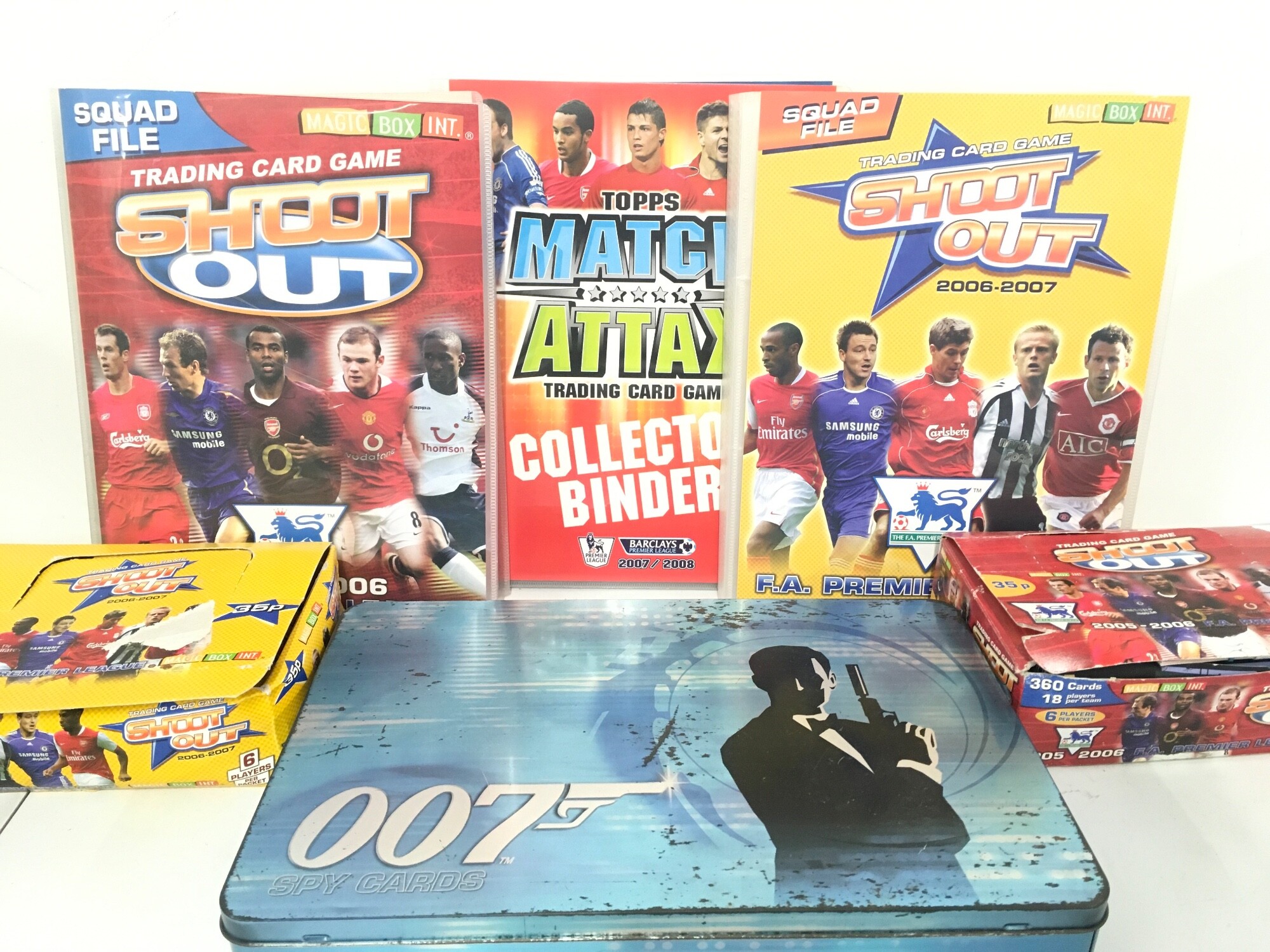 A Box Containing Football. James Bond And Yu-Gi-oh Trading Cards. No Reserve.