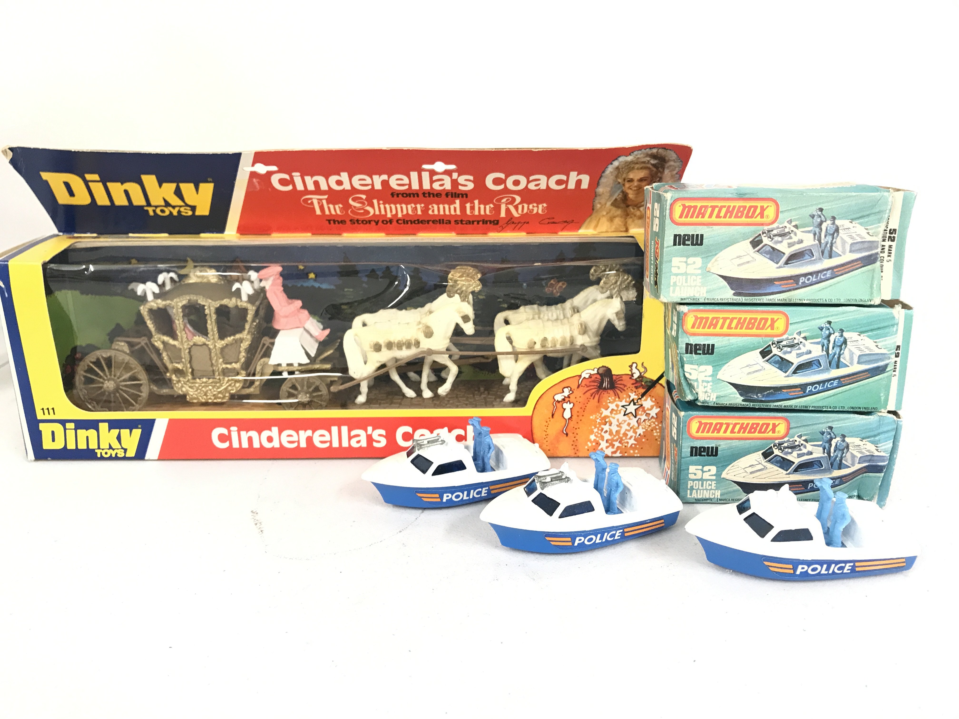 A Boxed Dinky Cinderellas Coach And 3 Matchbox Police Launches.