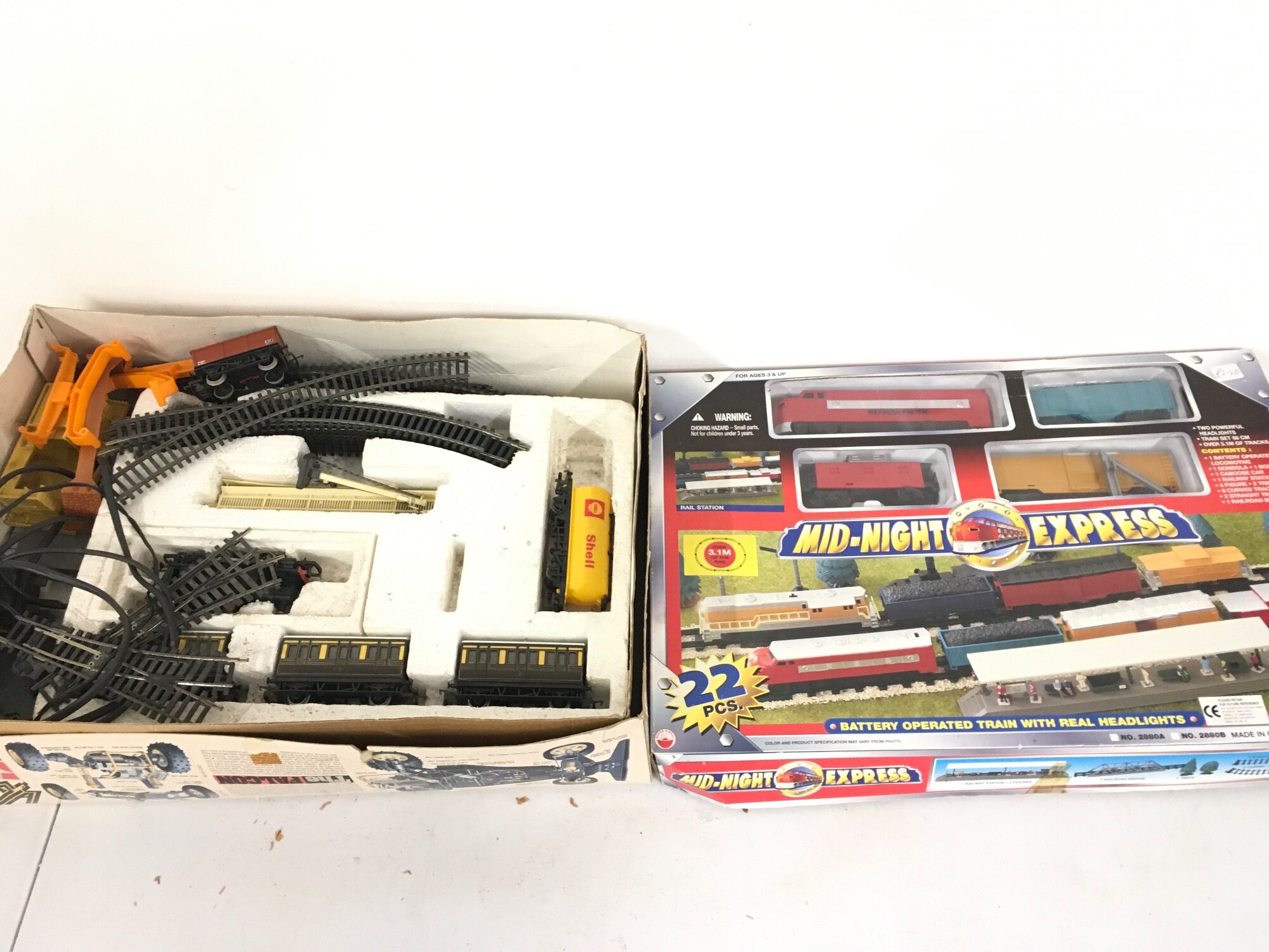 A boxed midnight express train set and one other