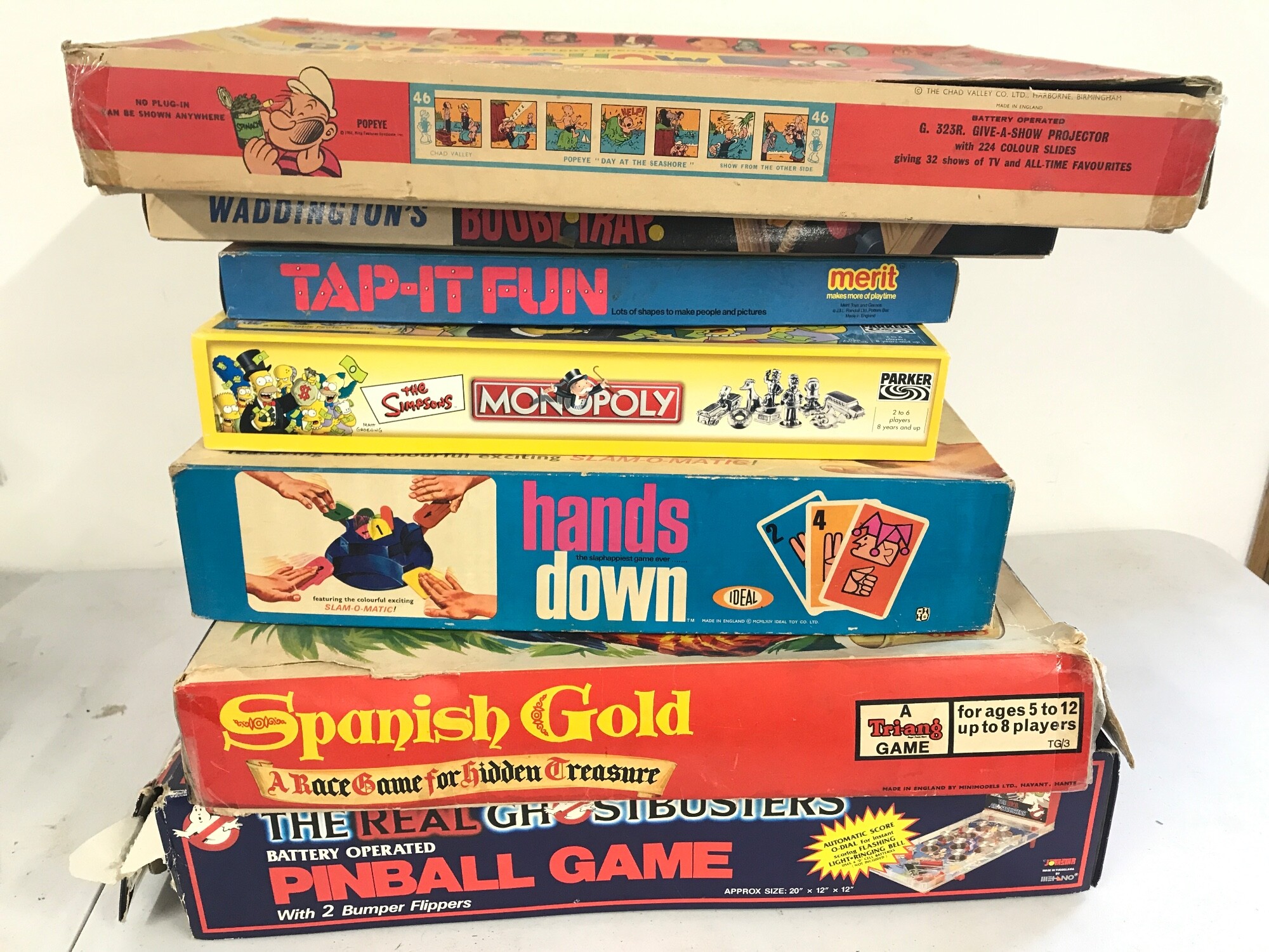 Assorted board games and other including hands down and Simpsons monopoly.