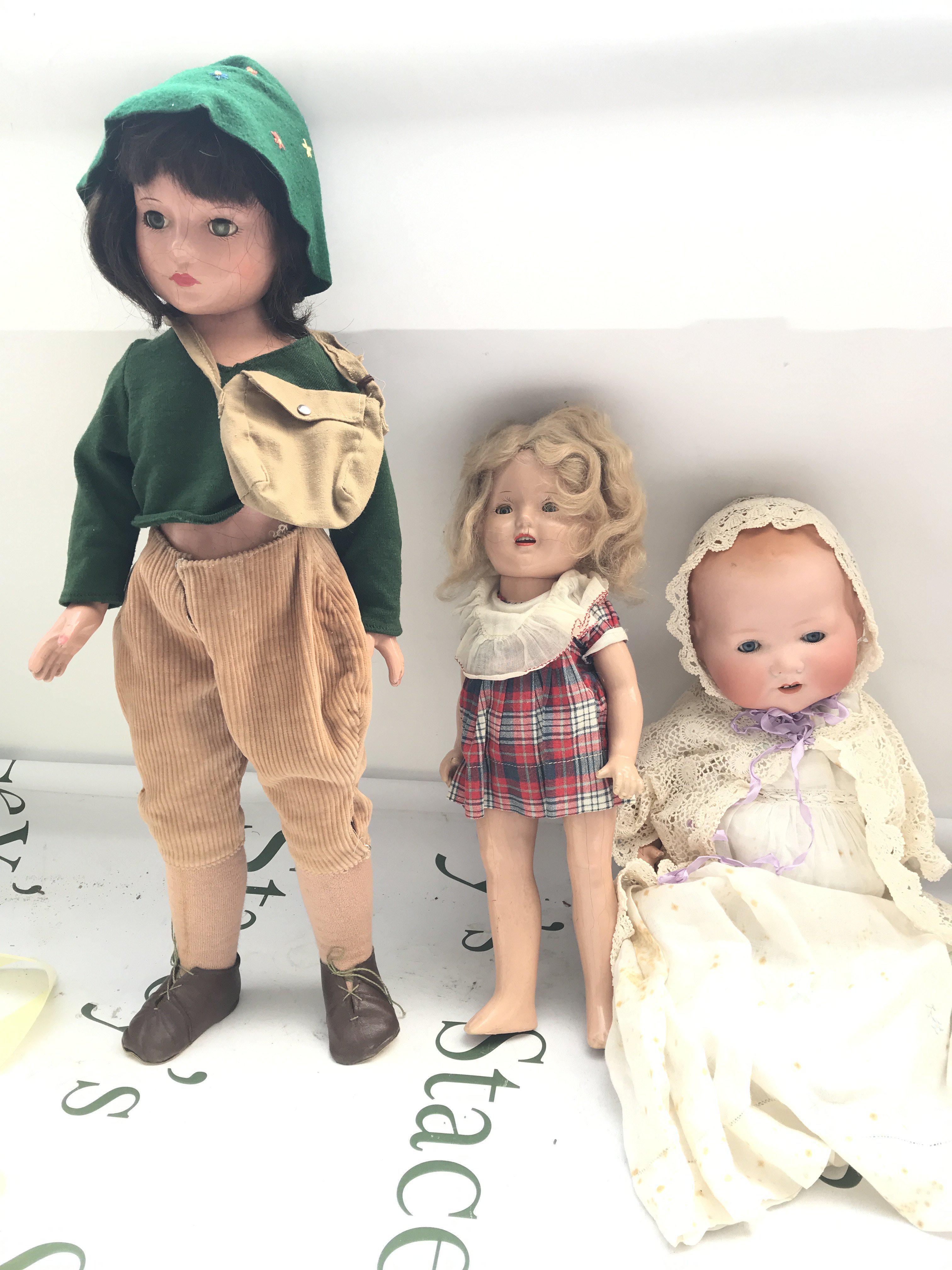 A Vintage AM German Doll With 2 Other Vintage Dolls. Some Damage.
