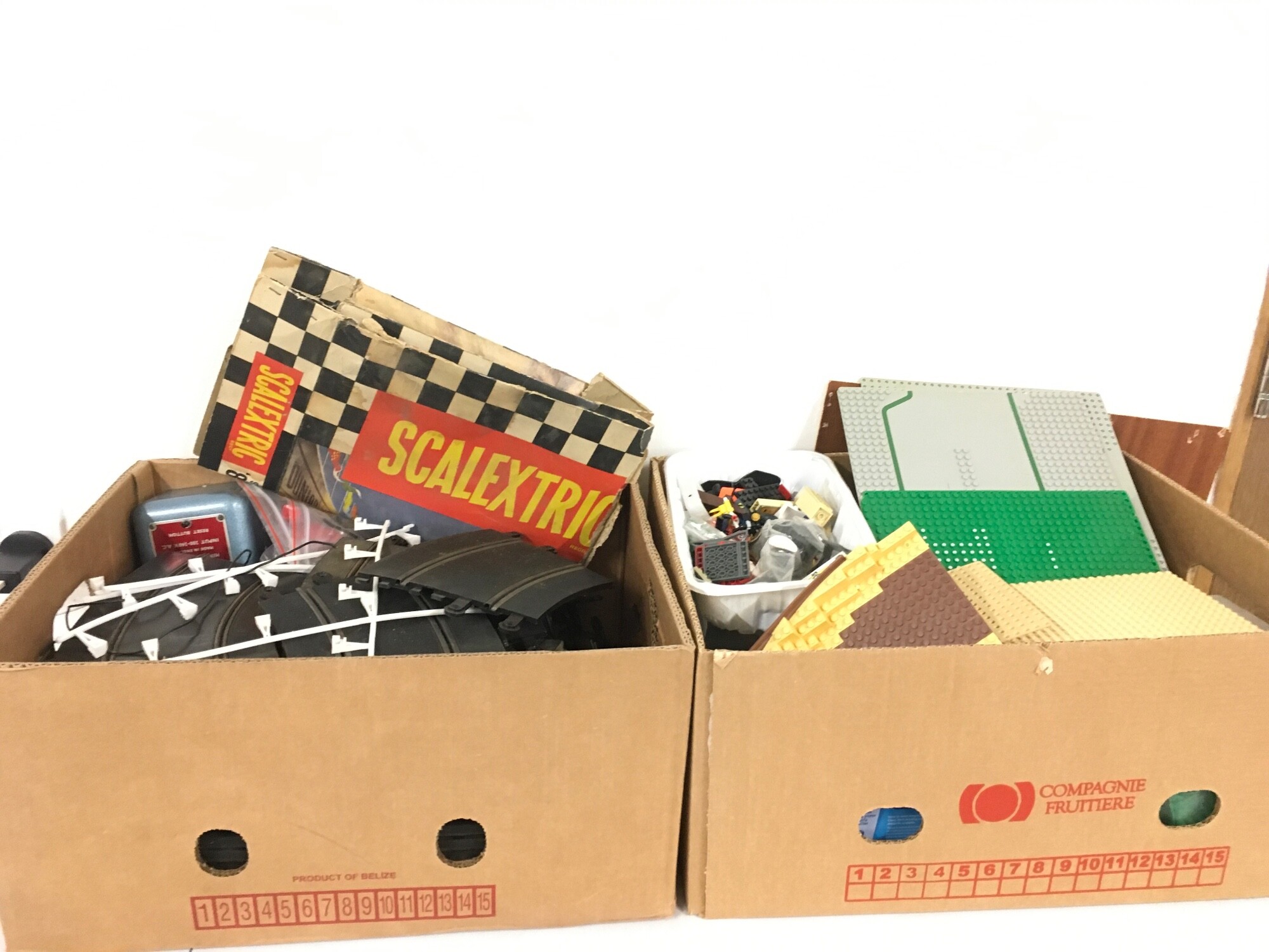 2 boxes one containing Scalextric track and accessories the second contains a selection of used Lego items.  No reserve (2)