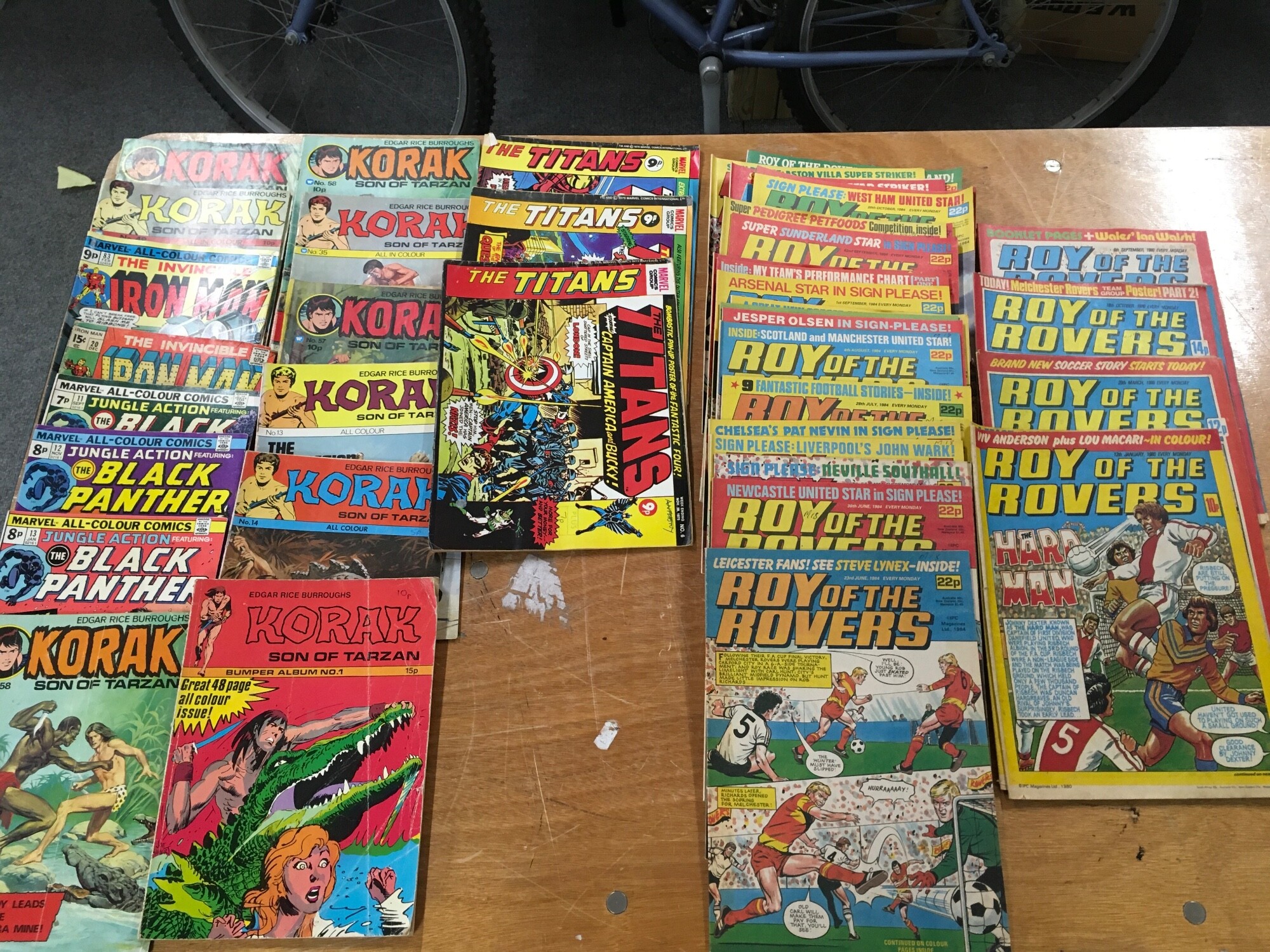 An assorted collection of comics including Iron man and Roy of the Rover