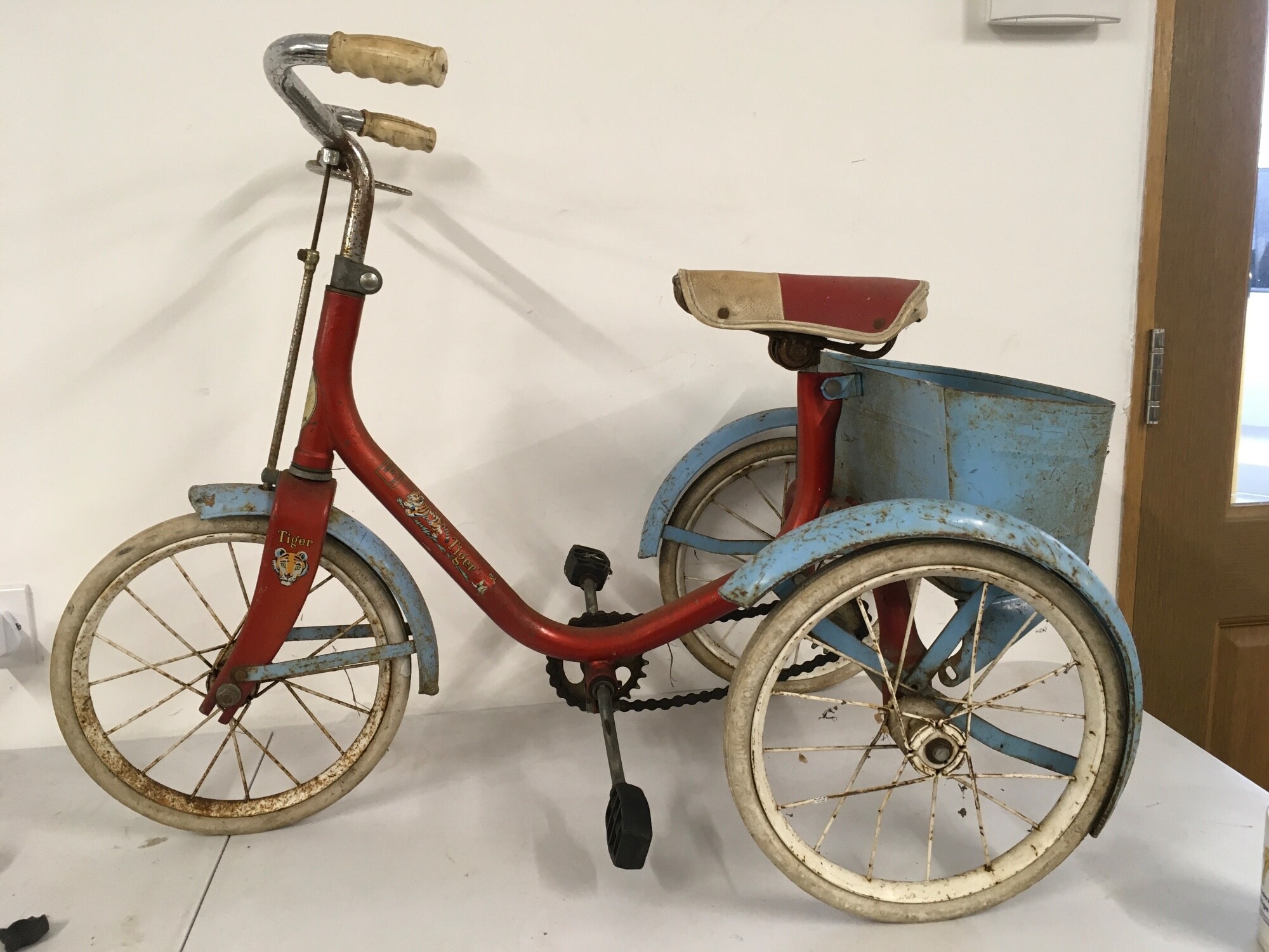A vintage Sunbeam Tiger child’s Tricycle with original rear carrier box.  No reserve