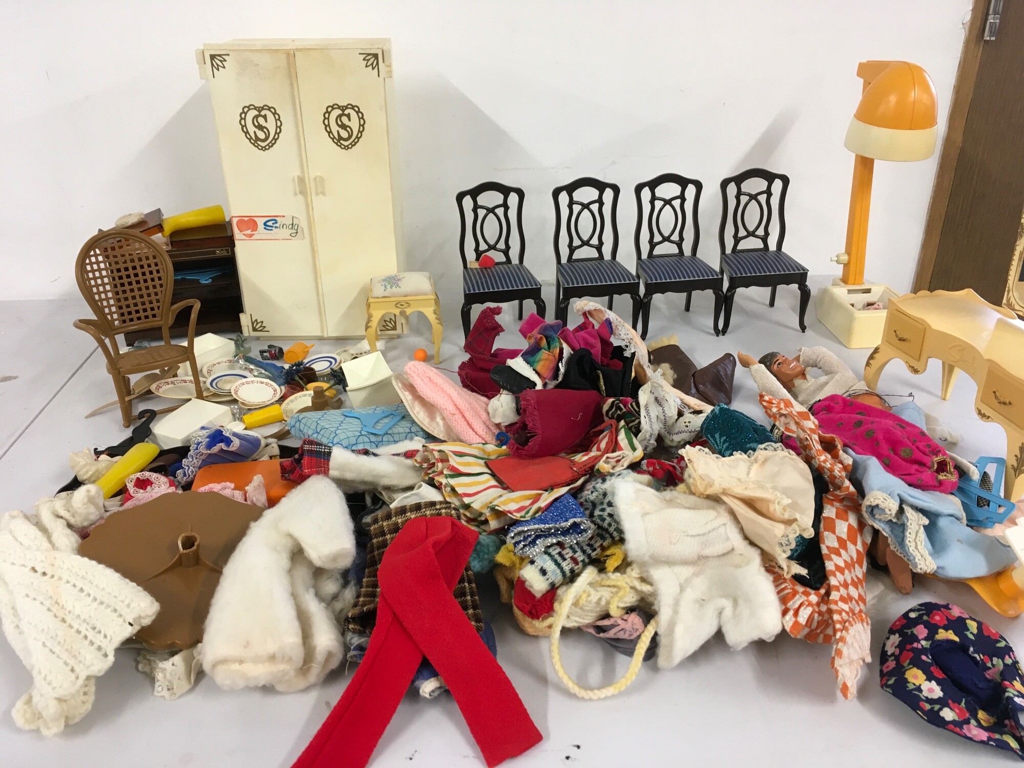 A collection of Sindy accessories includes clothing, furniture etc.  no reserve