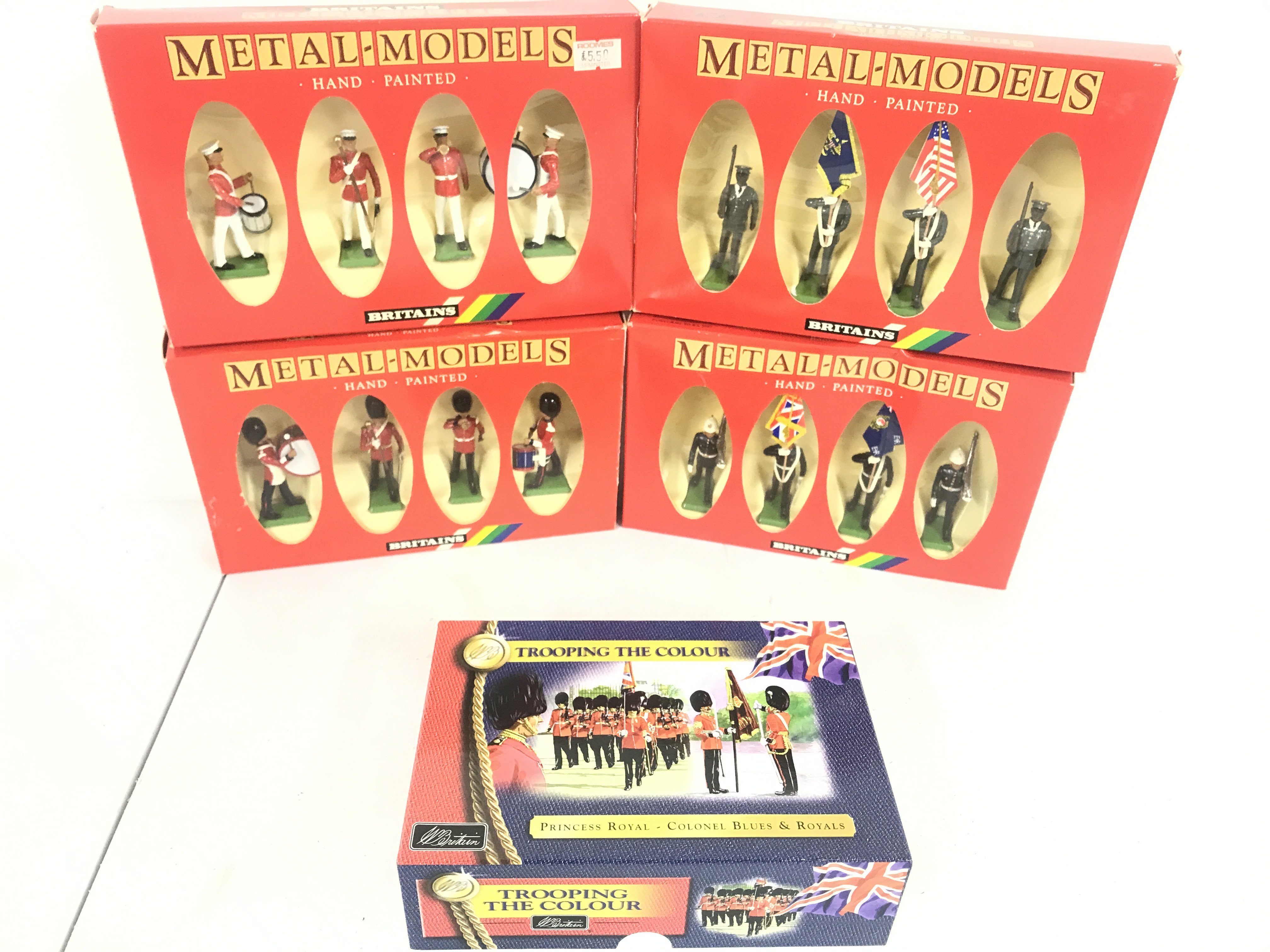 5 Boxed Britains Sets. Including U.S. Marine Drum And Bugle corp #7304. Scots Guards #7210. Royal Marines #7201. U.S. Colour Party #7306 And A Trooping The Colour Set #40117.(5).