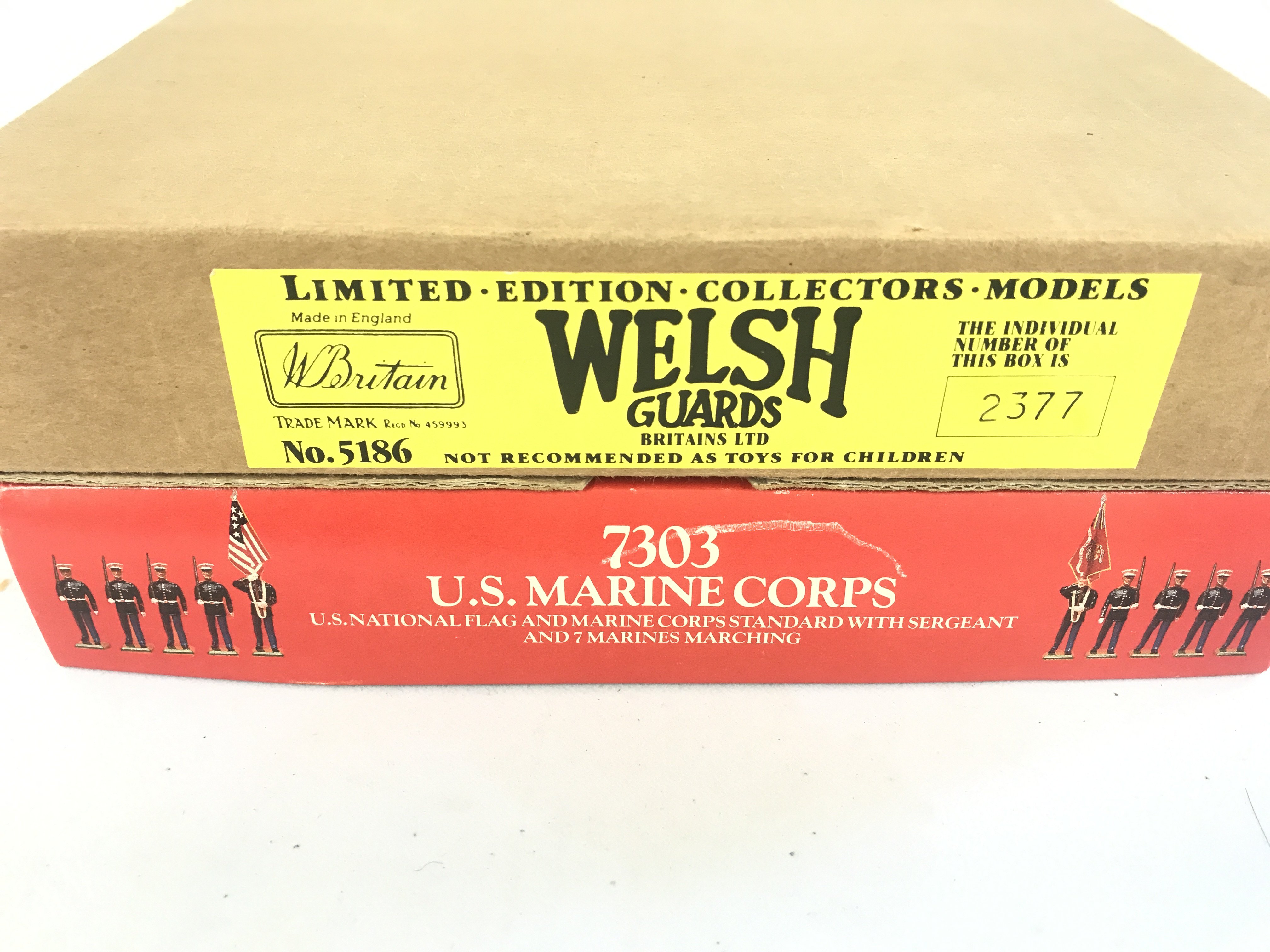 A Boxed Britains U.S. Marine Core Set #7303 And A Welsh Guards Set #5186. (2).