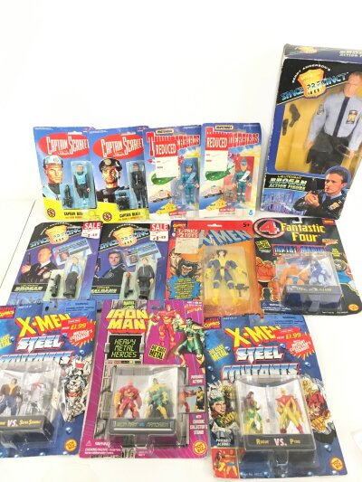 A Collection Of Various Carded Figures. Including Captain Scarlet. Thunderbirds. Space Precinct And Marvel. No Reserve.