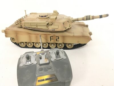 A Remote Controlled Tank And A Collection Of Loose Diecast.